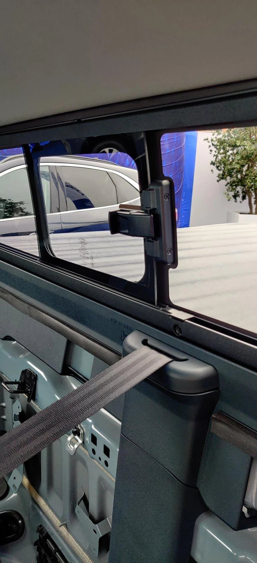 Ford Maverick Chicago Pics: 2022 Maverick Interior, Underhood / Engine, Rear Sliding Window, 4x4 Studs, Spare Tire, Undercarriage, Trailer Brake Controller Rear Sliding Window Port Maverick XLT hybrid 12