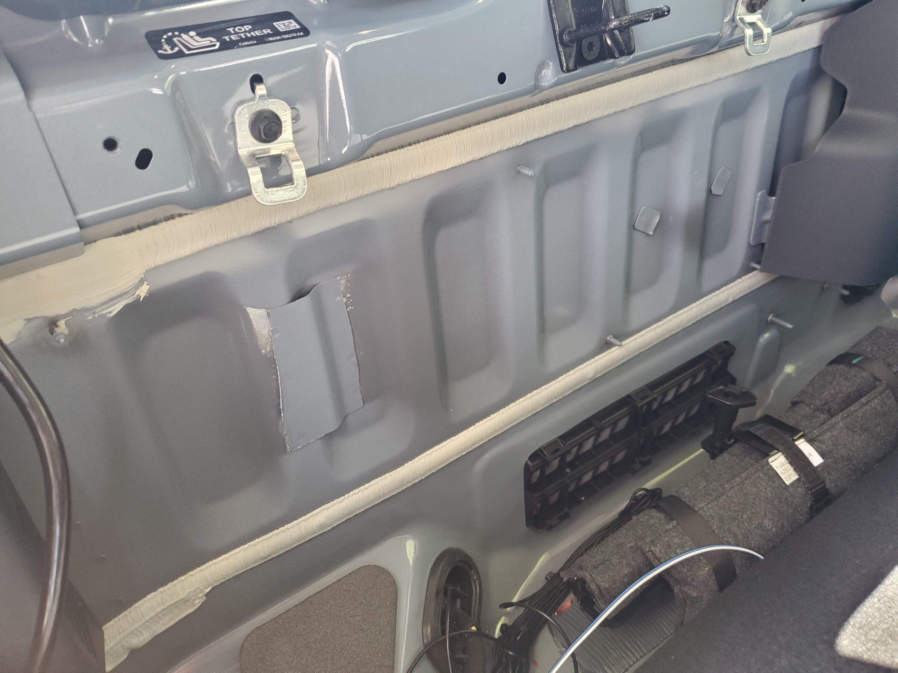 Ford Maverick Another method to mount Kicker Hideaway / amp board to back cabin wall 20230427_142753
