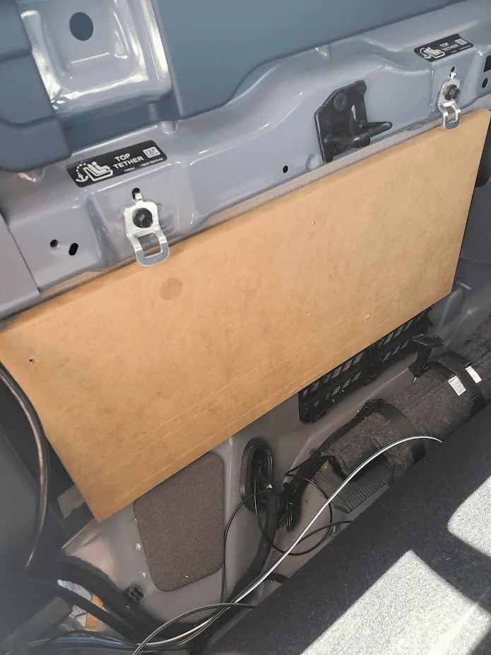 Ford Maverick Another method to mount Kicker Hideaway / amp board to back cabin wall 1682876694040