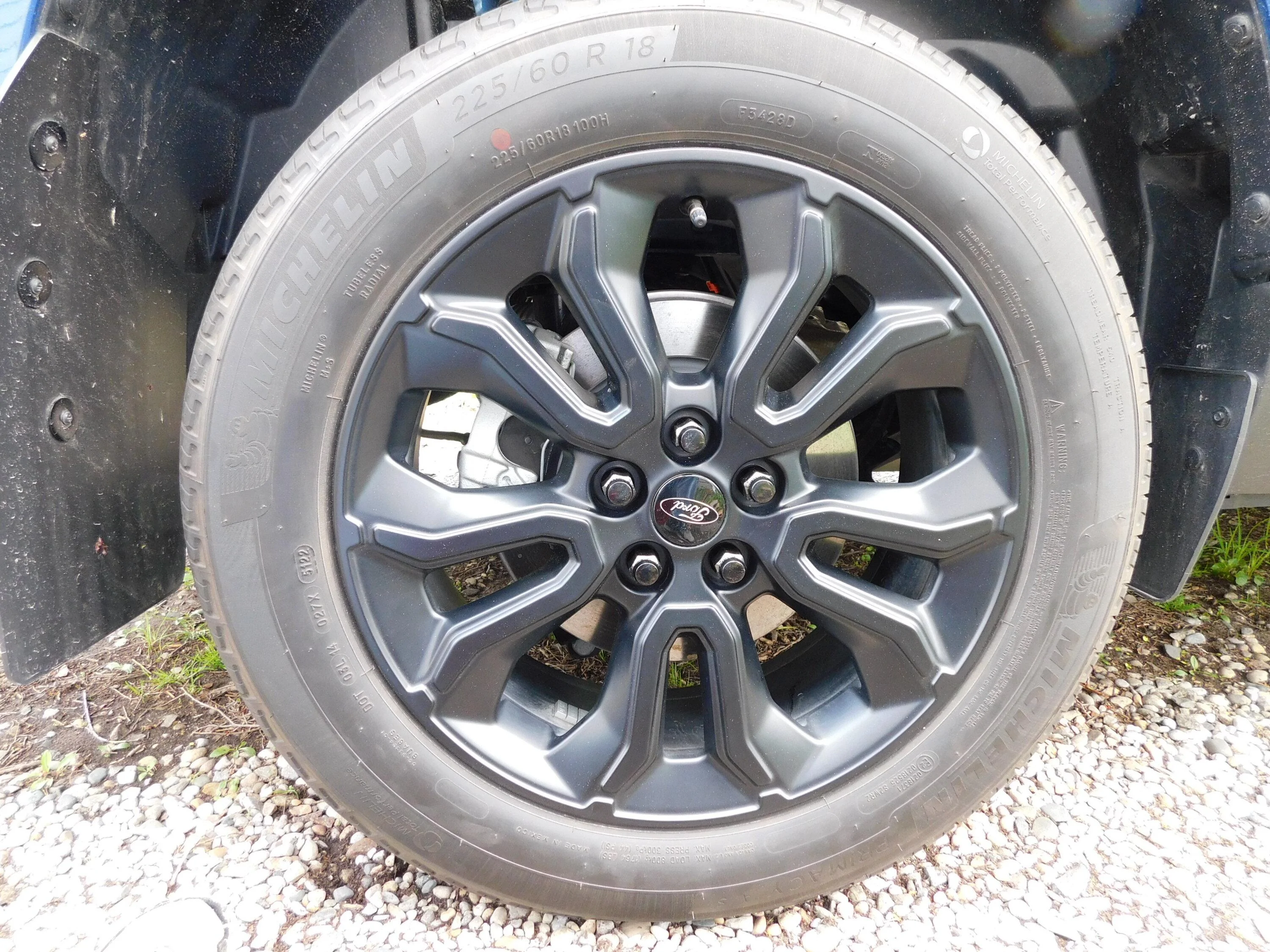 Ford Maverick I replaced the two piece stock lug nuts with one piece black lug nuts. after lugs