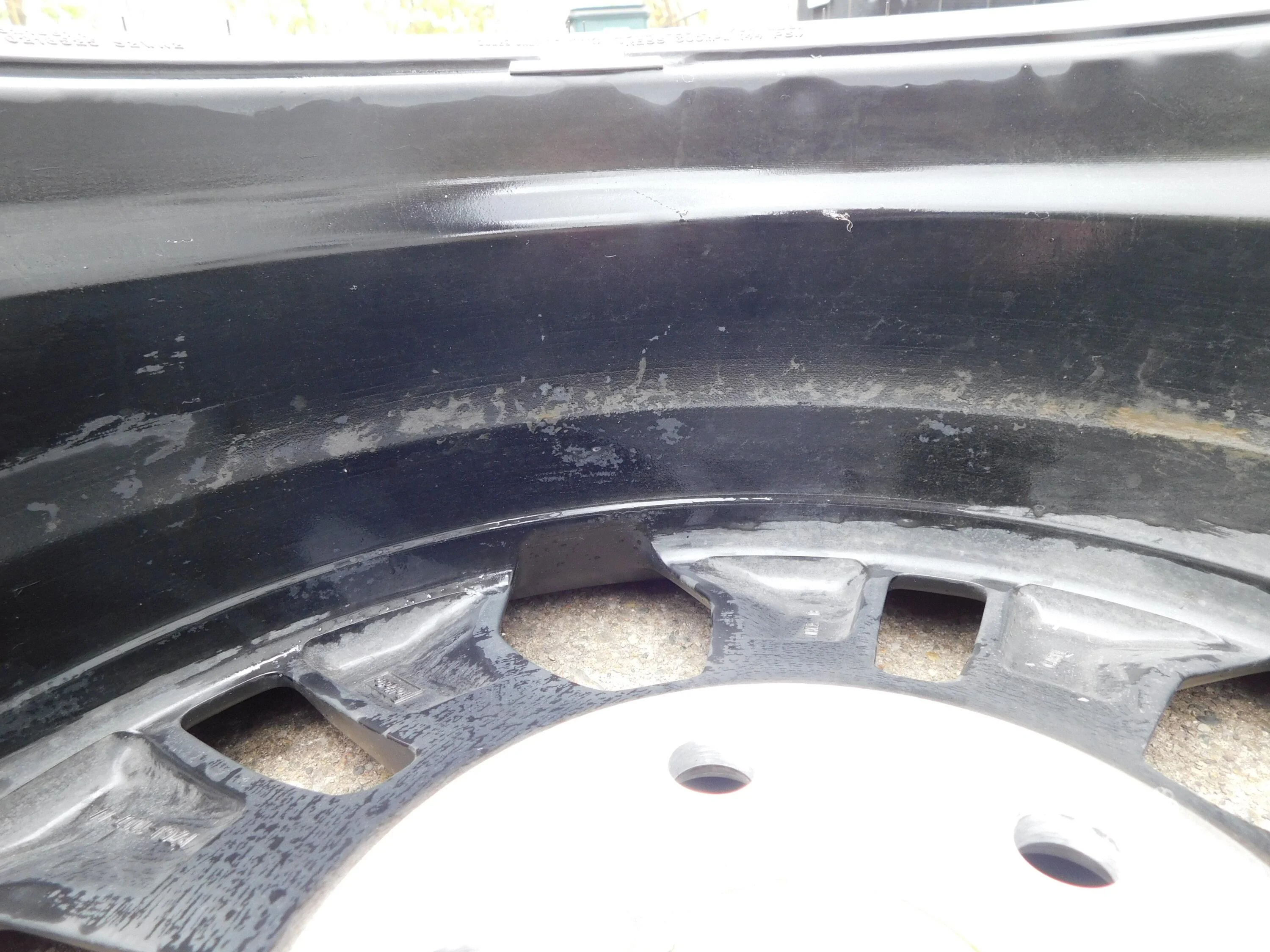 Ford Maverick I replaced the two piece stock lug nuts with one piece black lug nuts. rim2