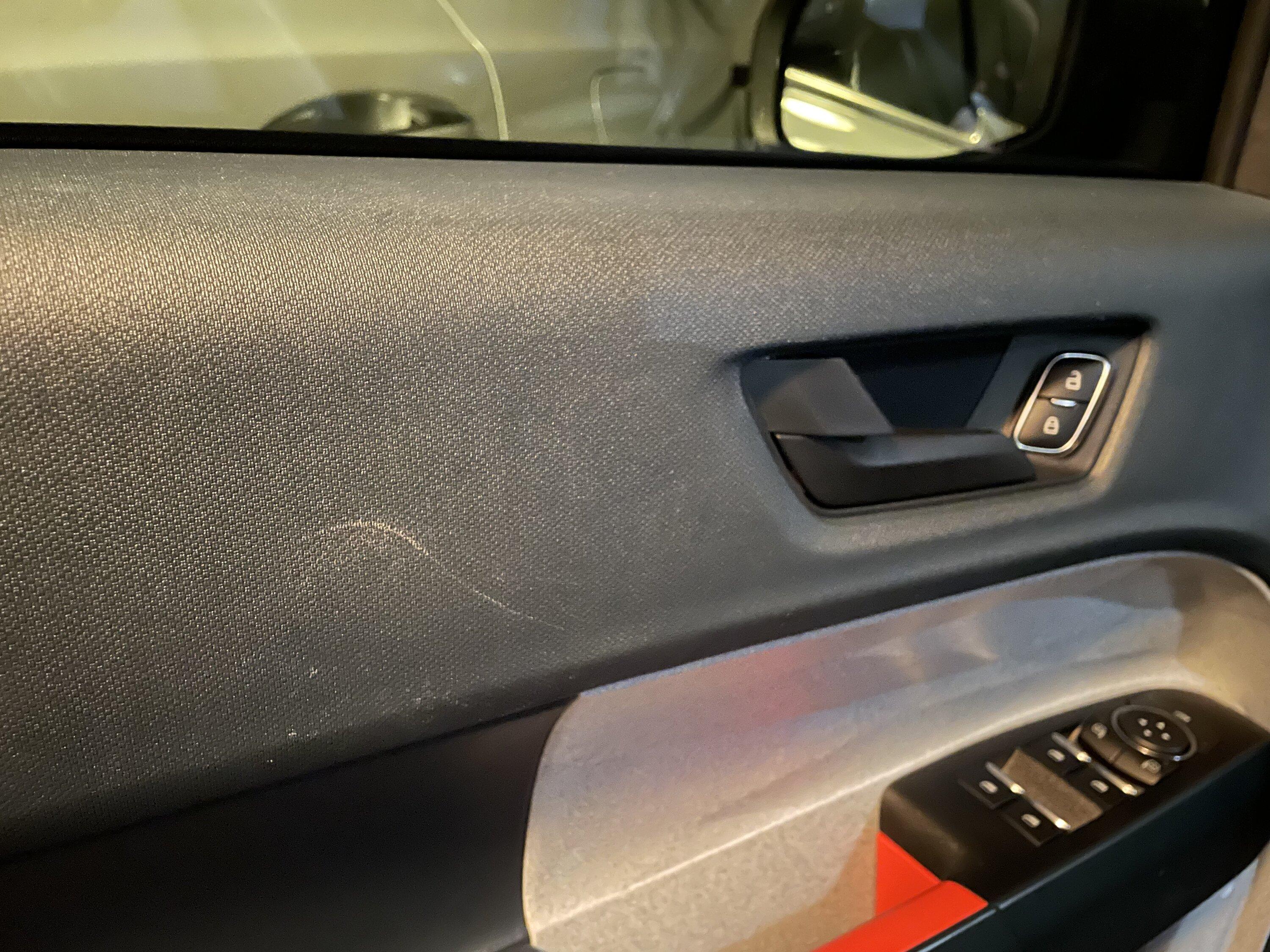 Ford Maverick Remove scratches on dark blue textured interior door trim panel? E4E953A9-6F84-47E2-B26A-943B27634CCD