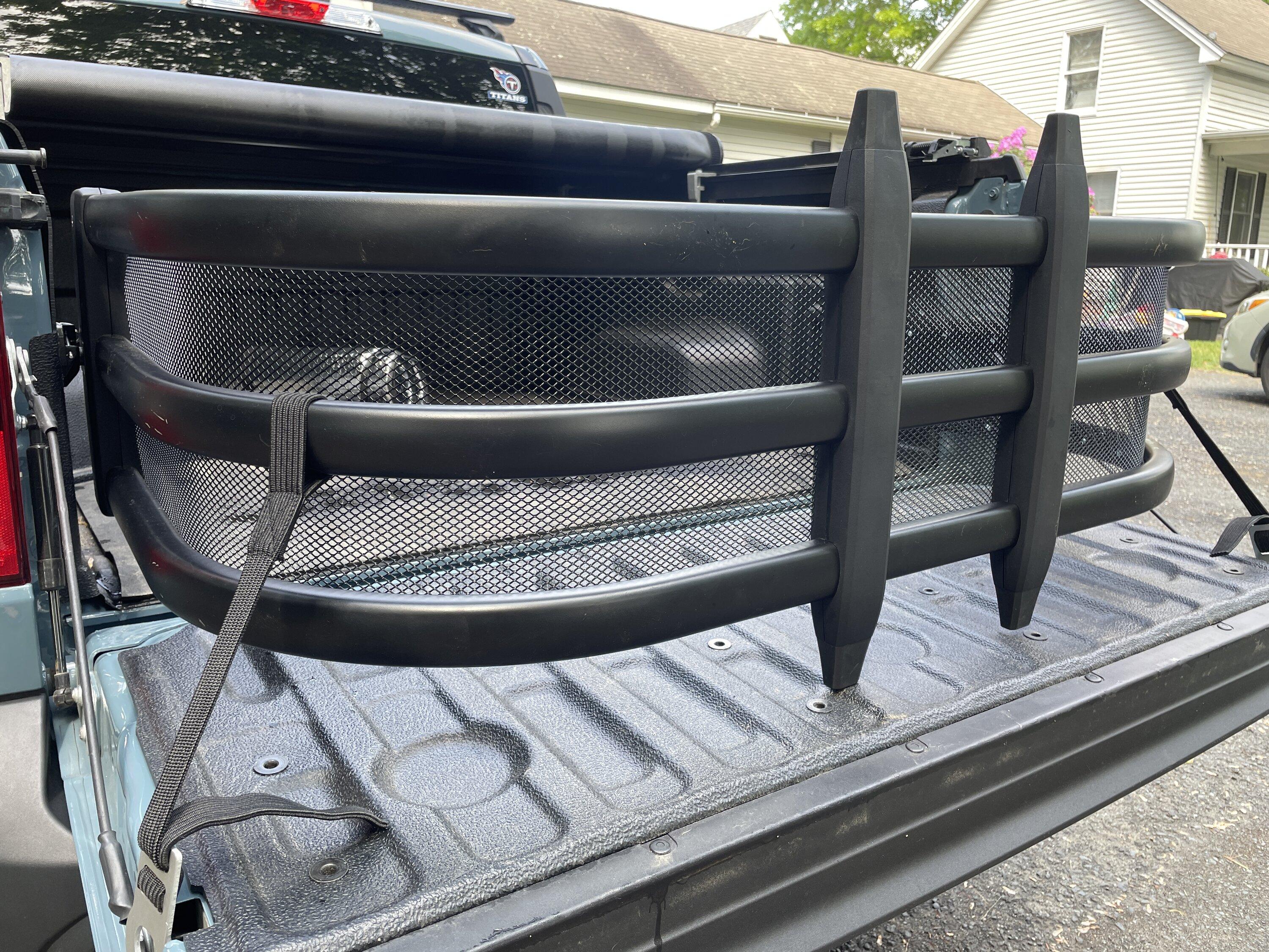 Ford Maverick Bed extender with gutter guards mesh installed IMG_5088