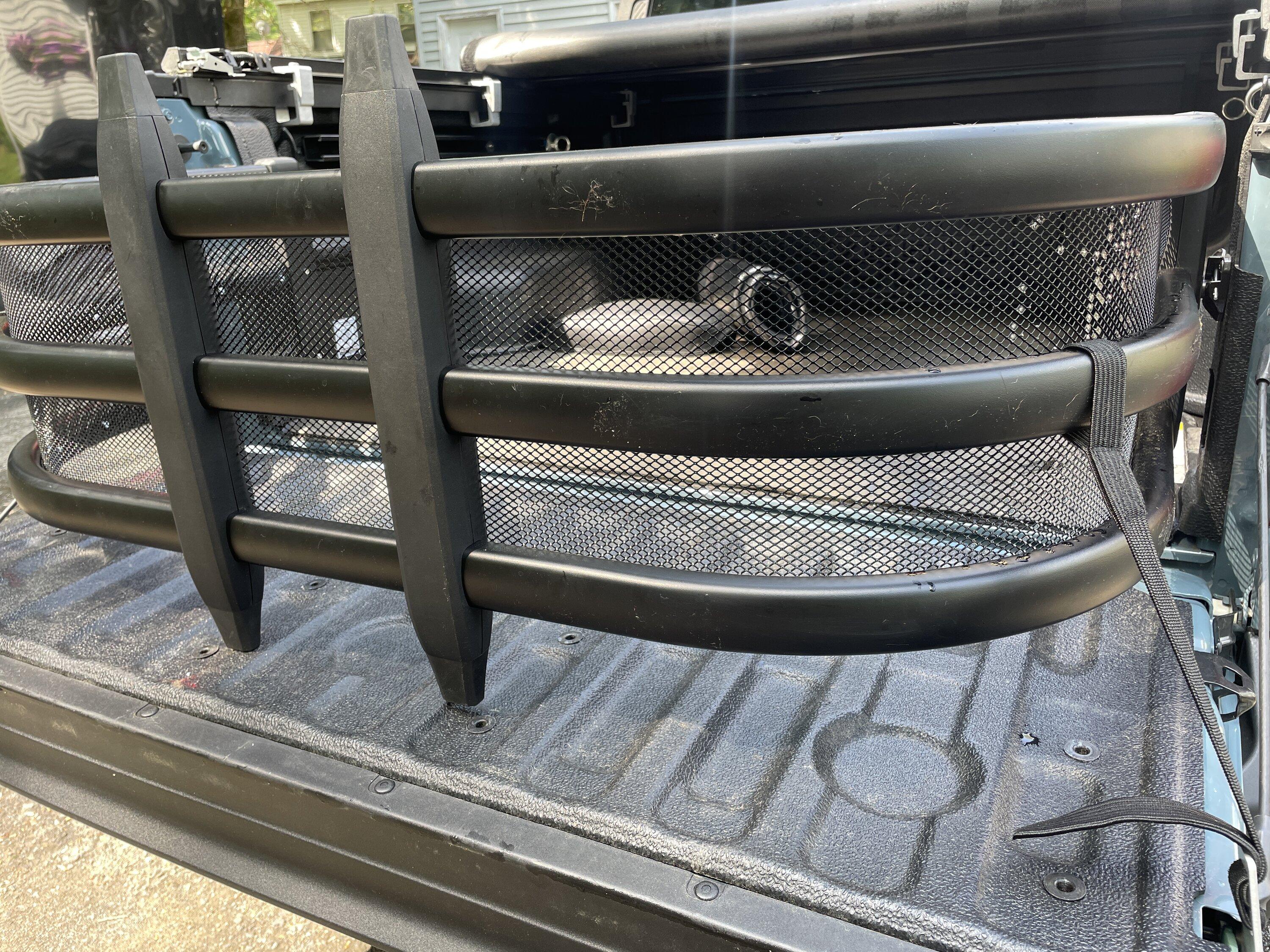 Ford Maverick Bed extender with gutter guards mesh installed IMG_5089