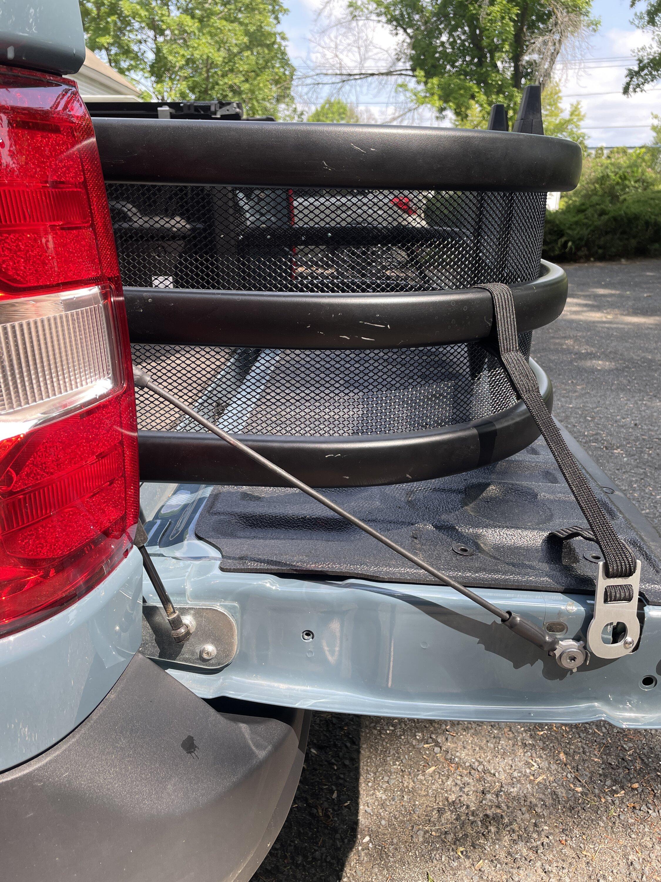 Ford Maverick Bed extender with gutter guards mesh installed IMG_5091