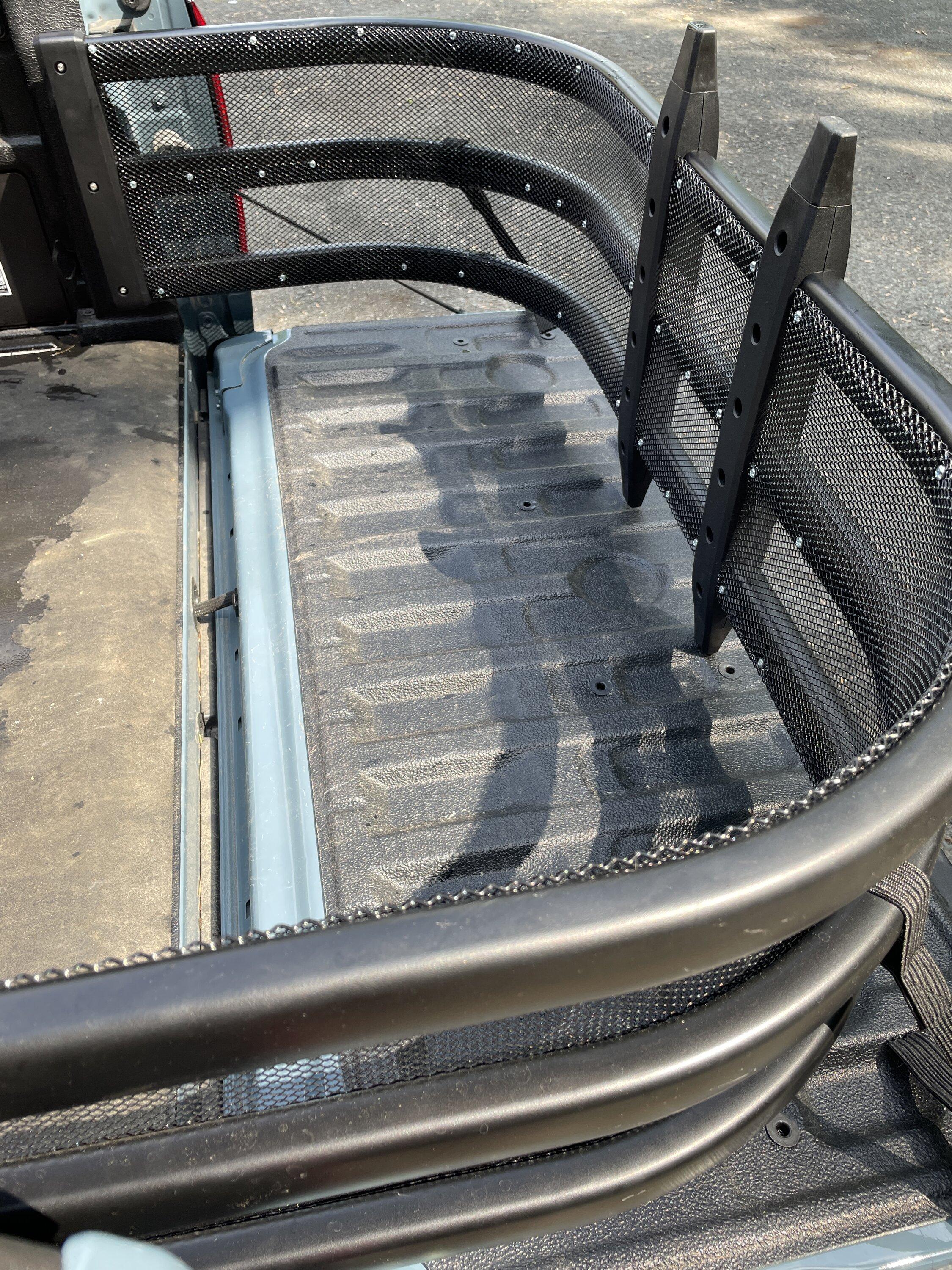 Ford Maverick Bed extender with gutter guards mesh installed IMG_5090