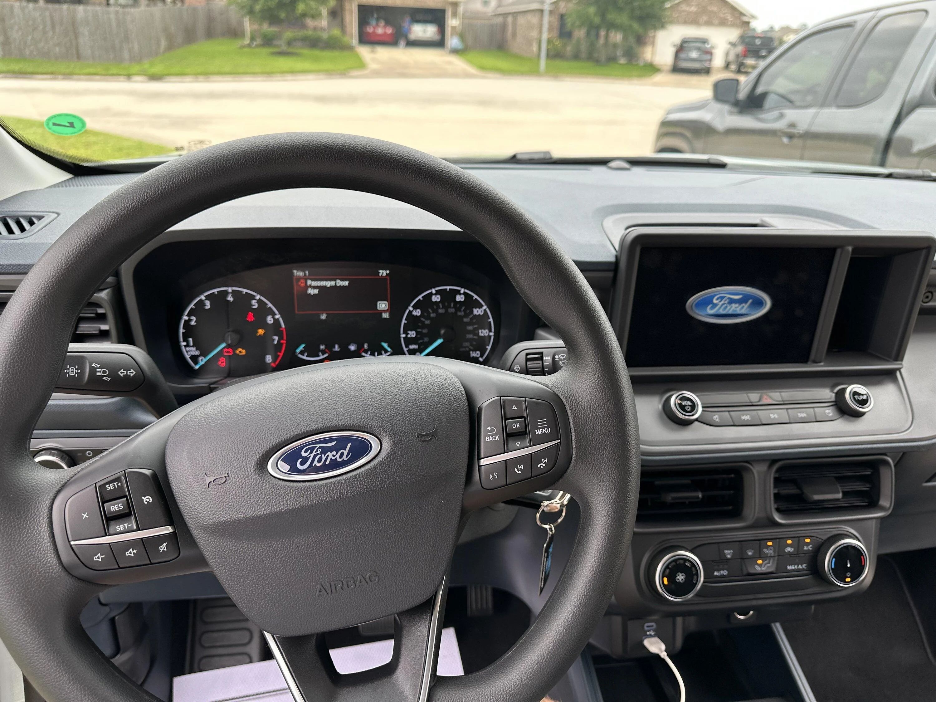 Ford Maverick New from Tomball, TX - 2023 2.0 AWD Cactus Gray IMG_1731