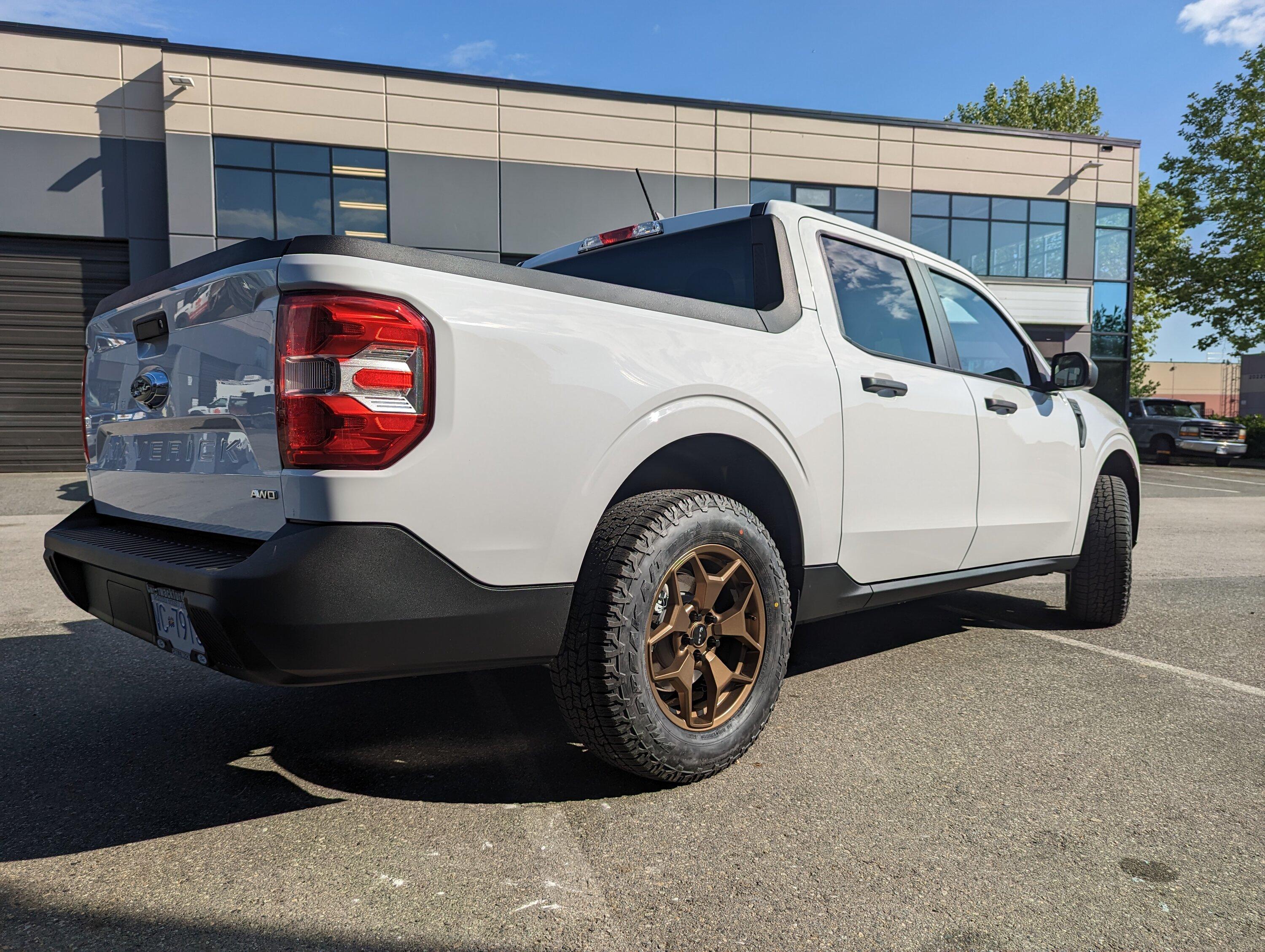 Ford Maverick Bronze painted RTX ranch wheels on Oxford White Maverick PXL_20230526_000746057