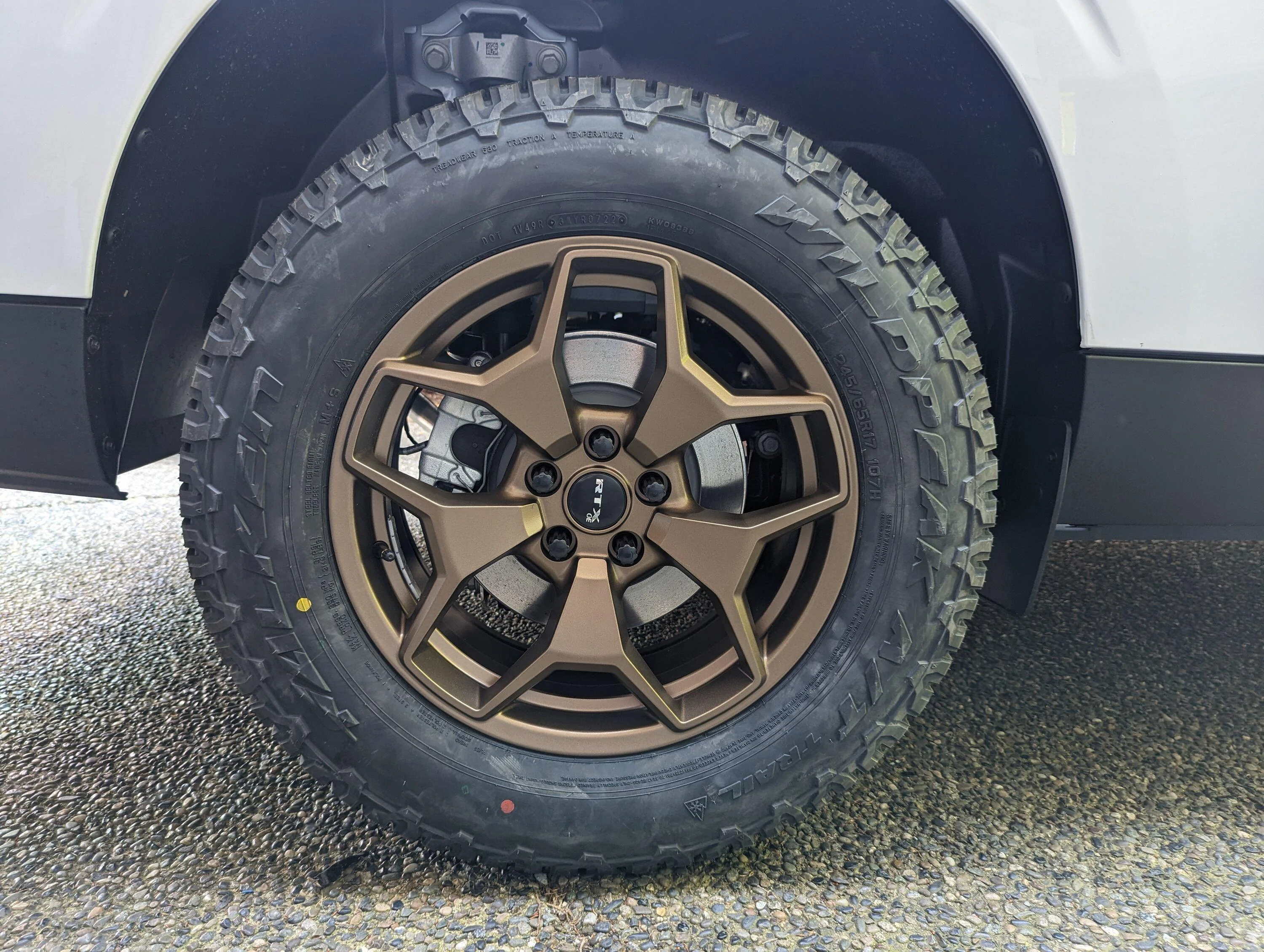 Ford Maverick Bronze painted RTX ranch wheels on Oxford White Maverick PXL_20230526_002411394