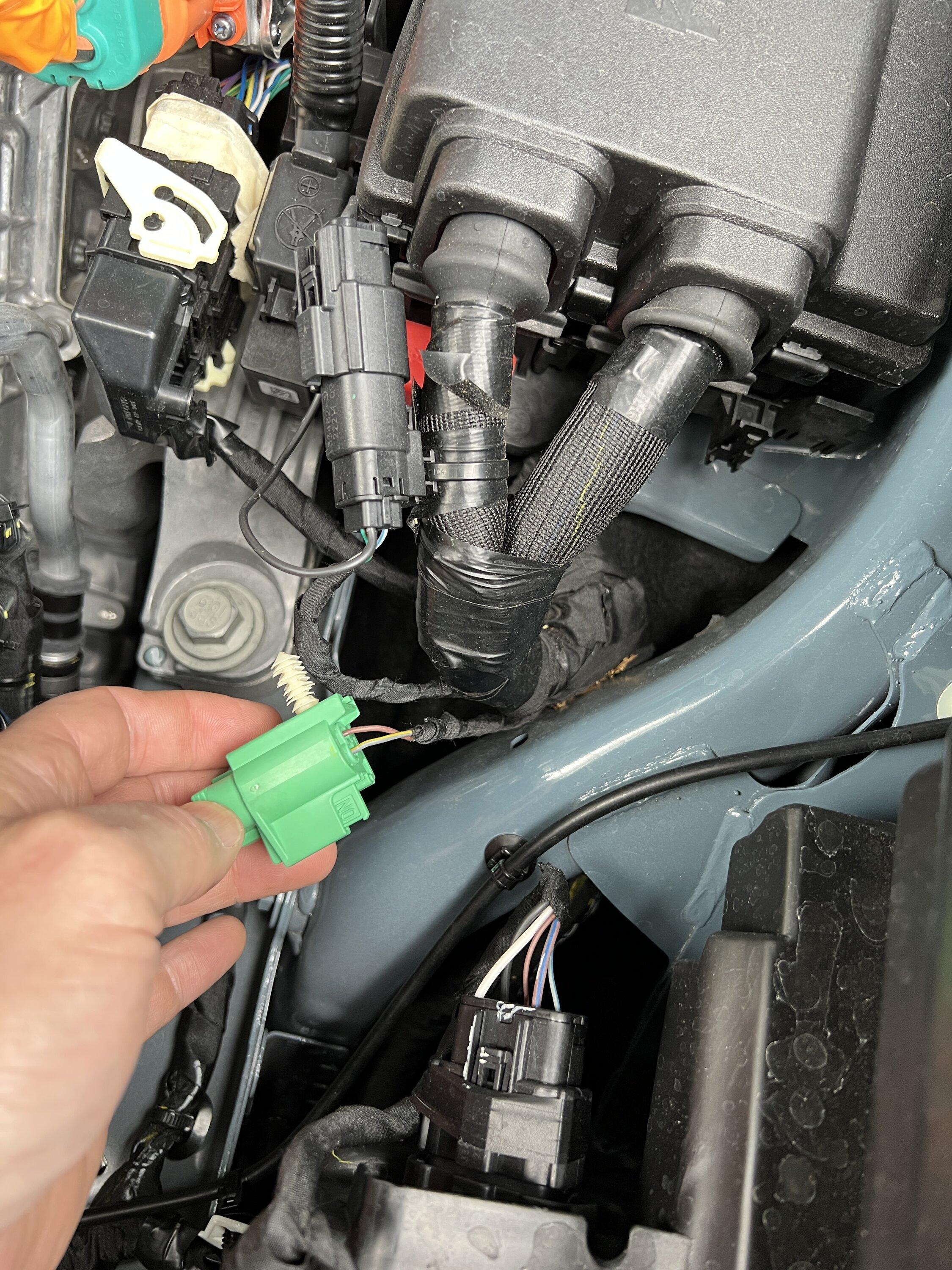 Ford Maverick Mystery green plug on the driver side IMG_2460
