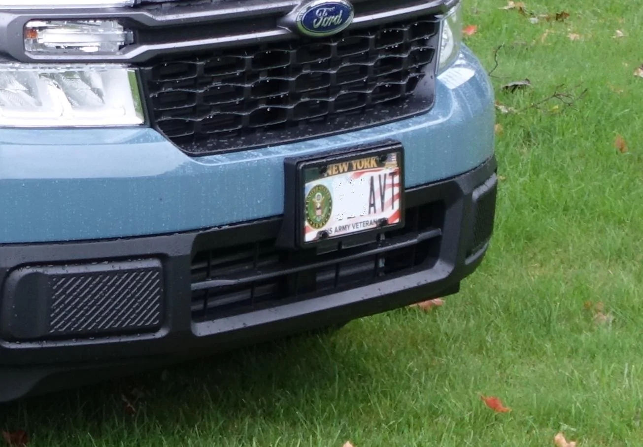 Ford Maverick License plate and car washes don't go together. clearplat