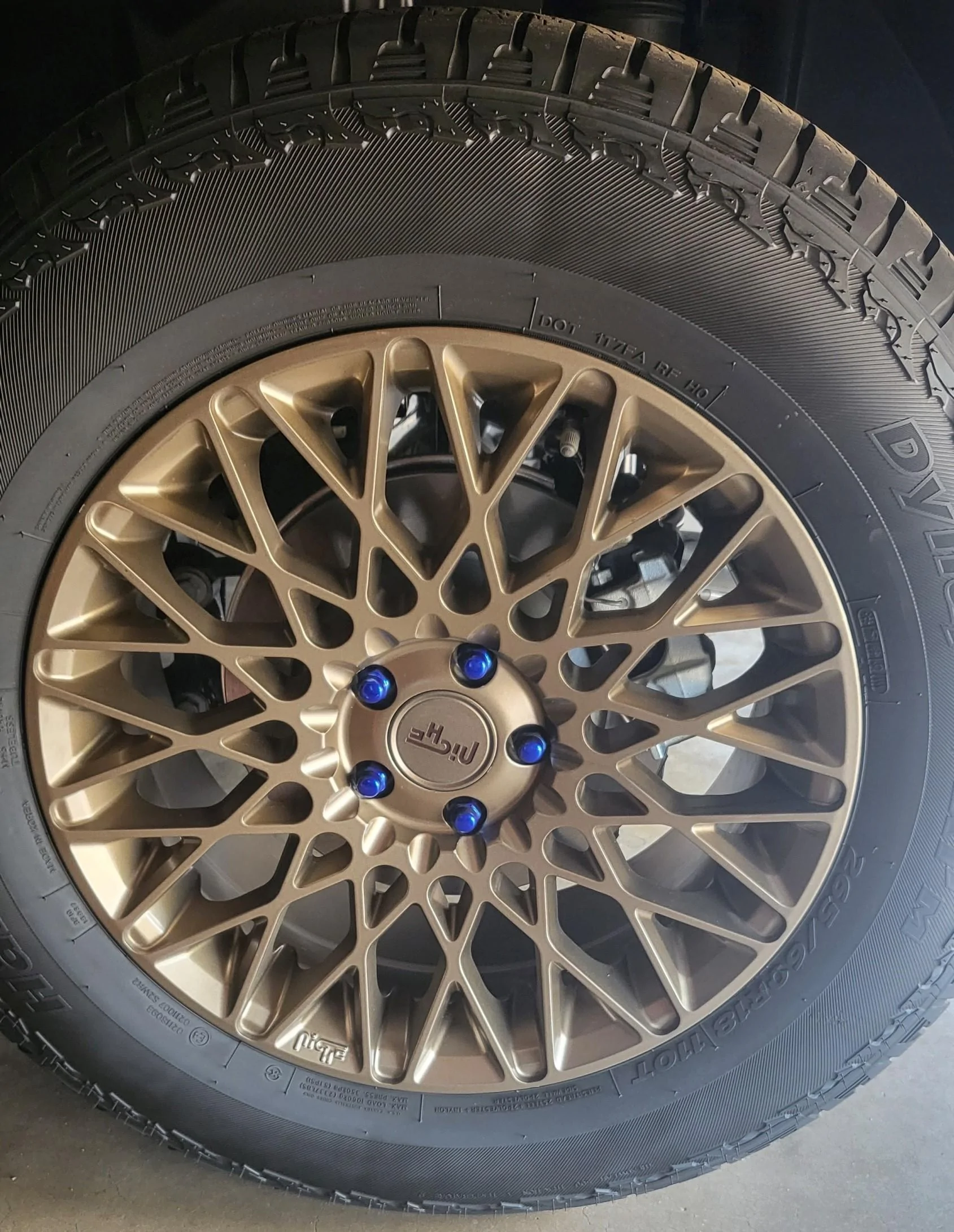 Ford Maverick Chrome Delete Project Part 3 - Lug Nuts Blue lug nuts