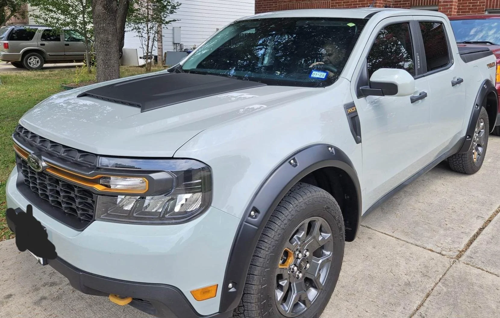 Ford Maverick Tremor with Ford hood scoop and Bushwacker fender flares received_640093127988713
