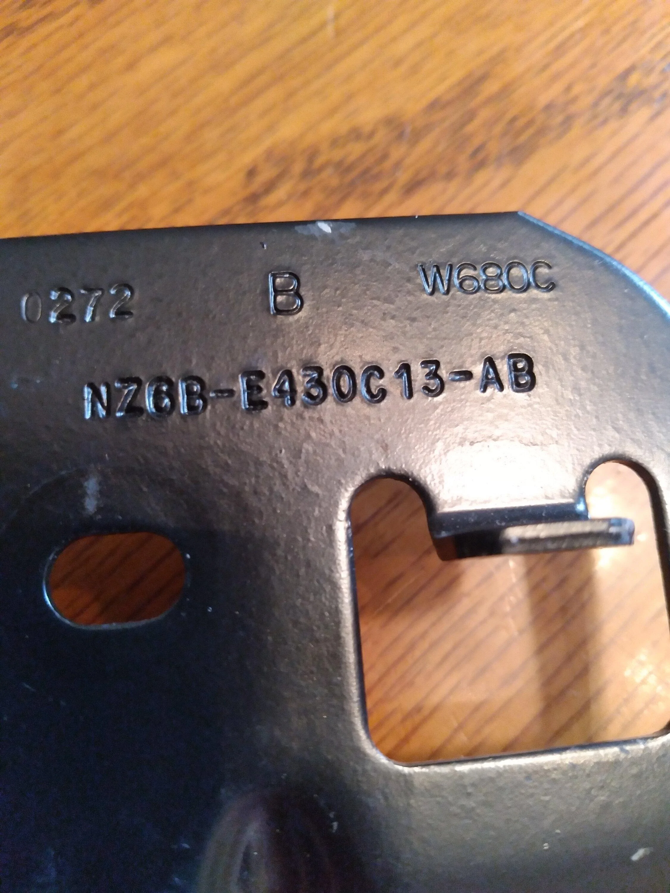 Ford Maverick Help identifying these two passenger side tailgate parts 20230710_175130