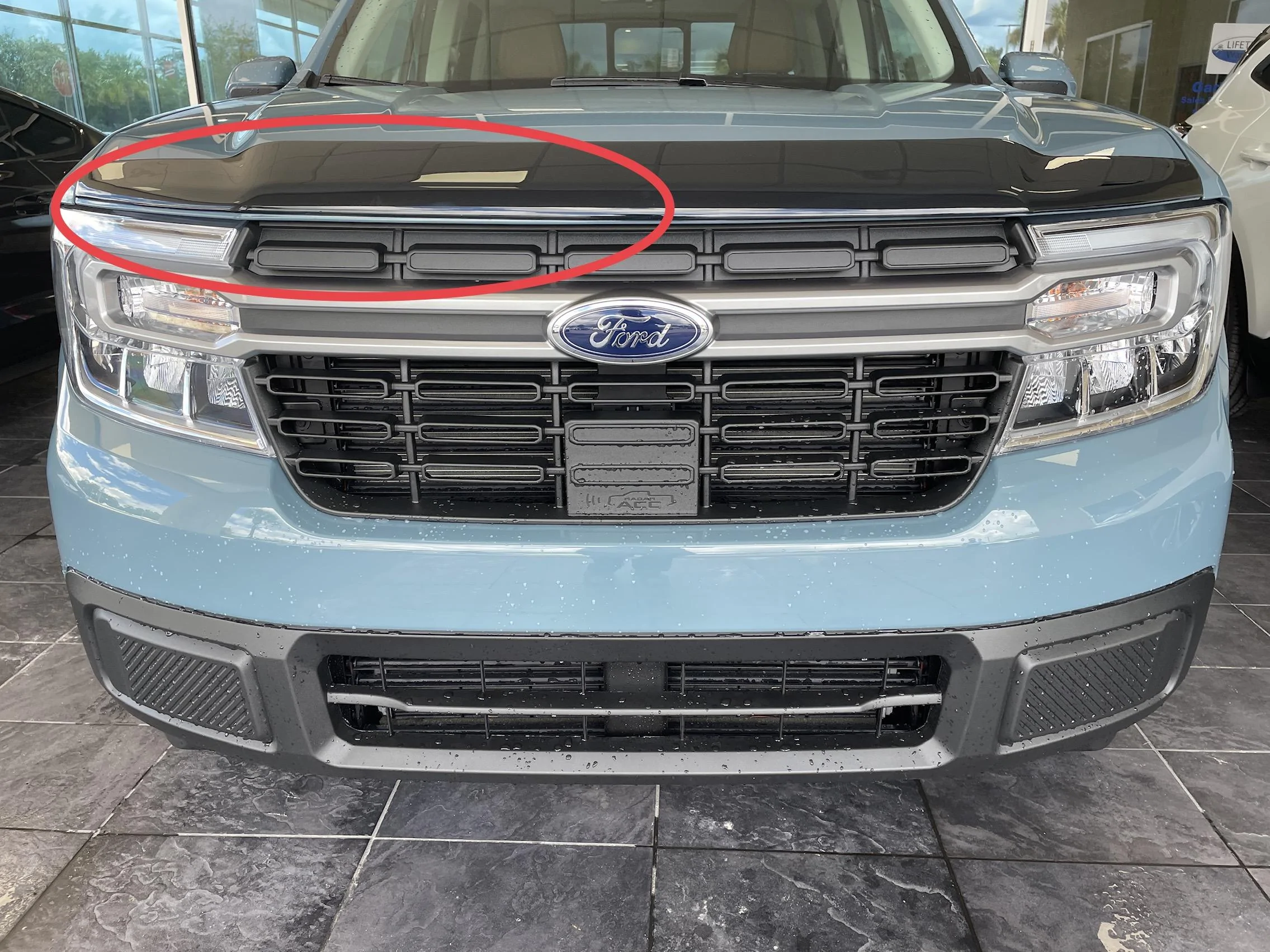 Ford Maverick Aeroskin and side reflectors installed IMG_2087
