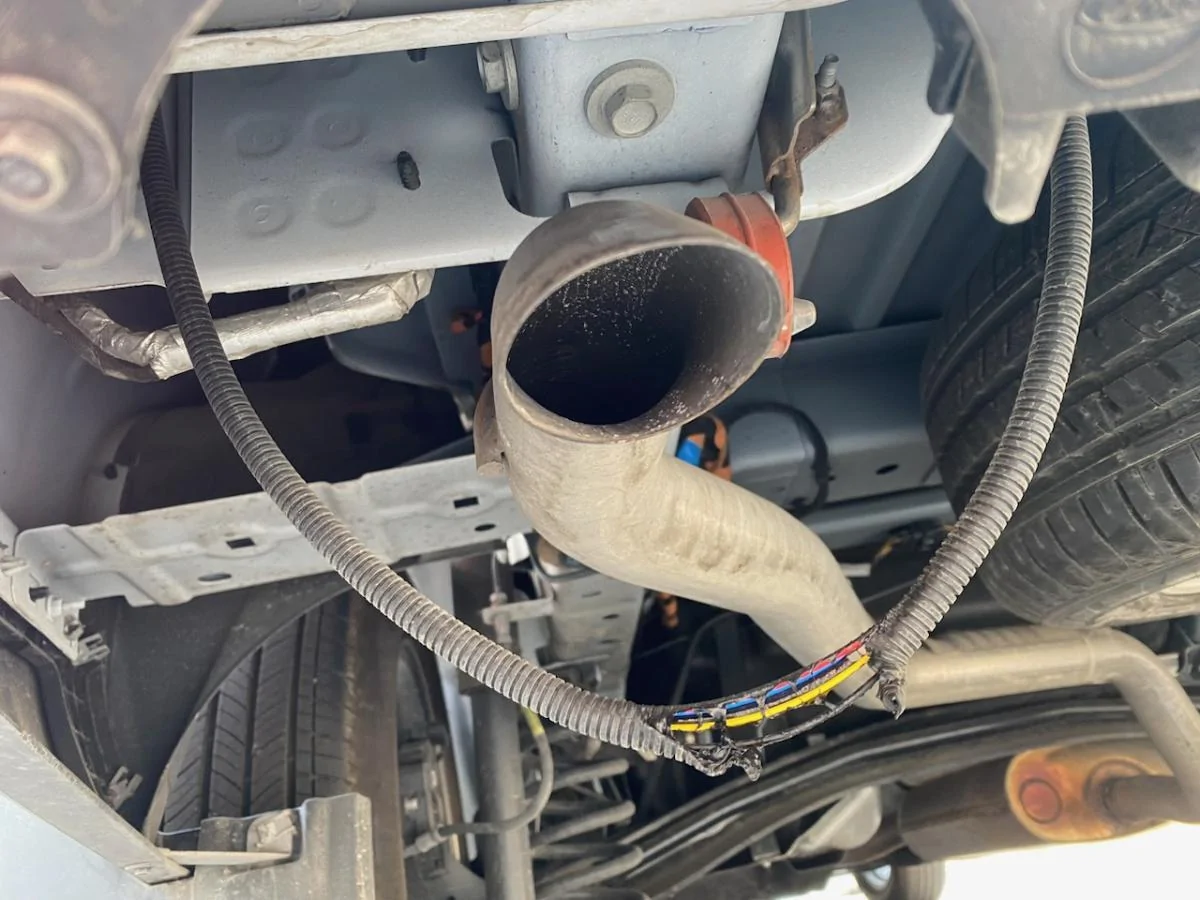 Ford Maverick Tailight wire sleeve melted by exhaust IMG_2524