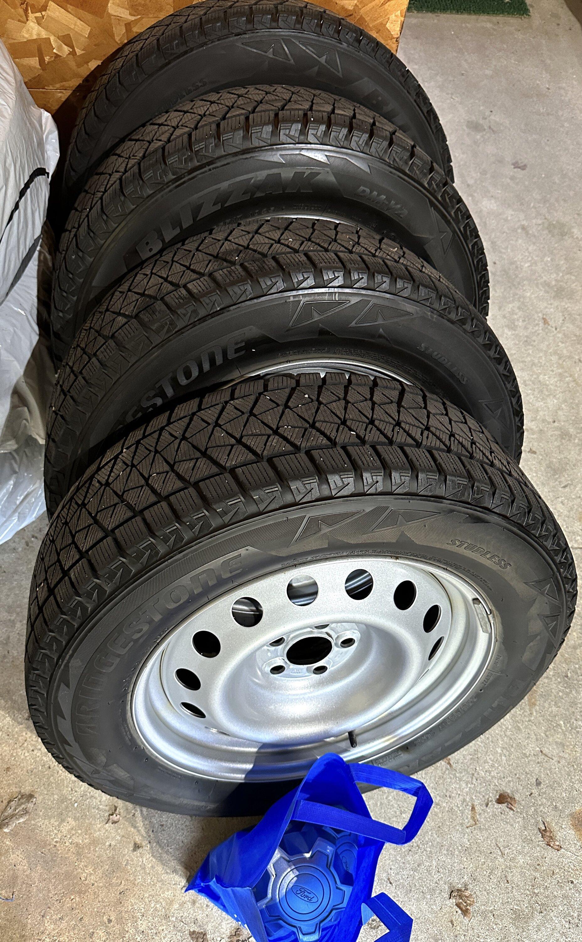 Ford Maverick Maverick steelies with Blizzaks side view all.JPG