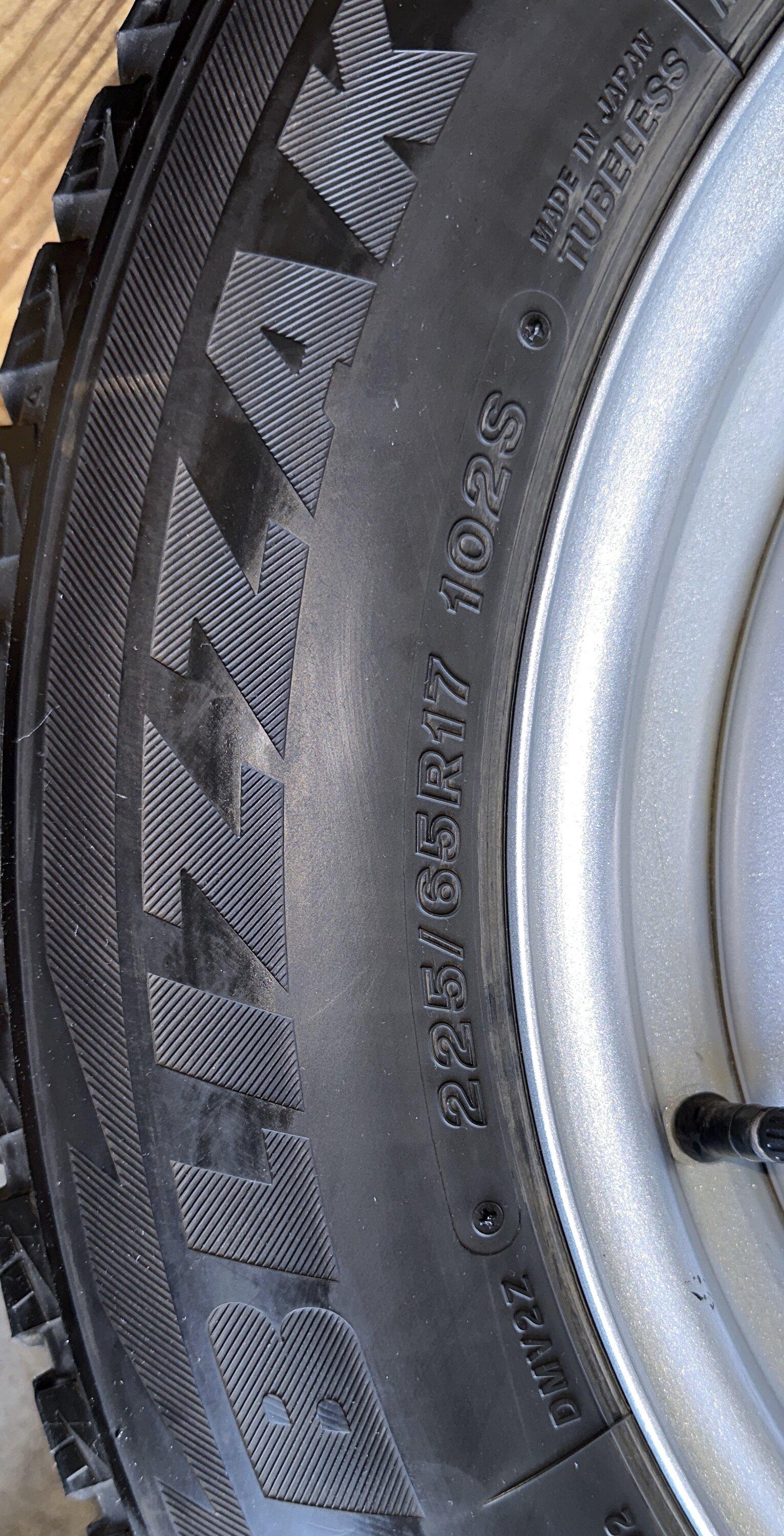 Ford Maverick Maverick steelies with Blizzaks size.JPG