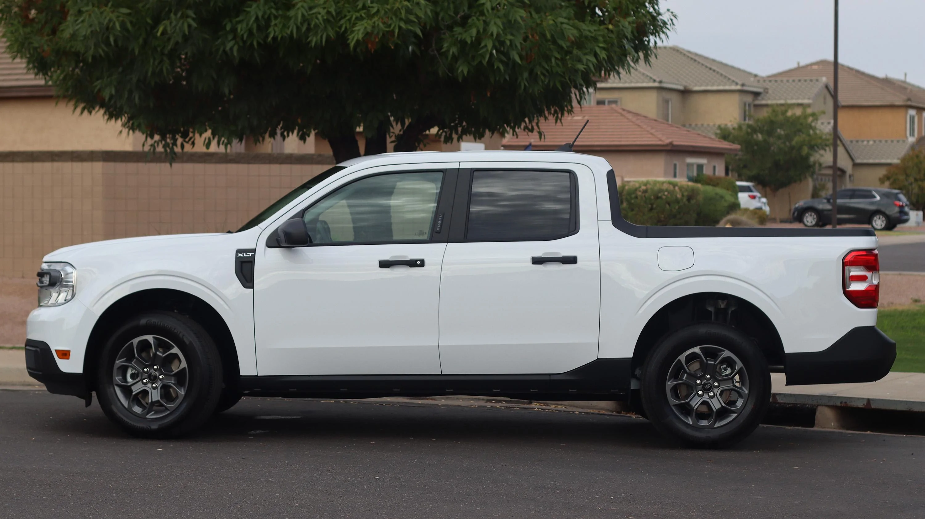 Ford Maverick White XLT Hybrid with 12 miles 🌵SOLD Side resized