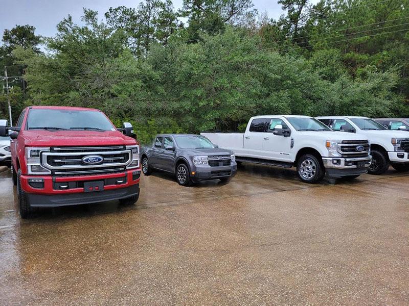 Ford Maverick My dealer just sent me pics of mine. Thing looks TINY next to these monsters. Maverick vs 250 Superduty Small