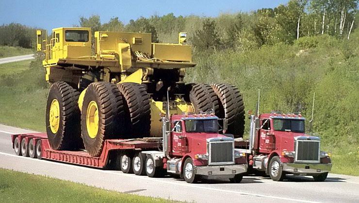Ford Maverick What do YOU think the 2025 Maverick facelift will look like? two-articulated-semi-trucks-hauling-mining-truck