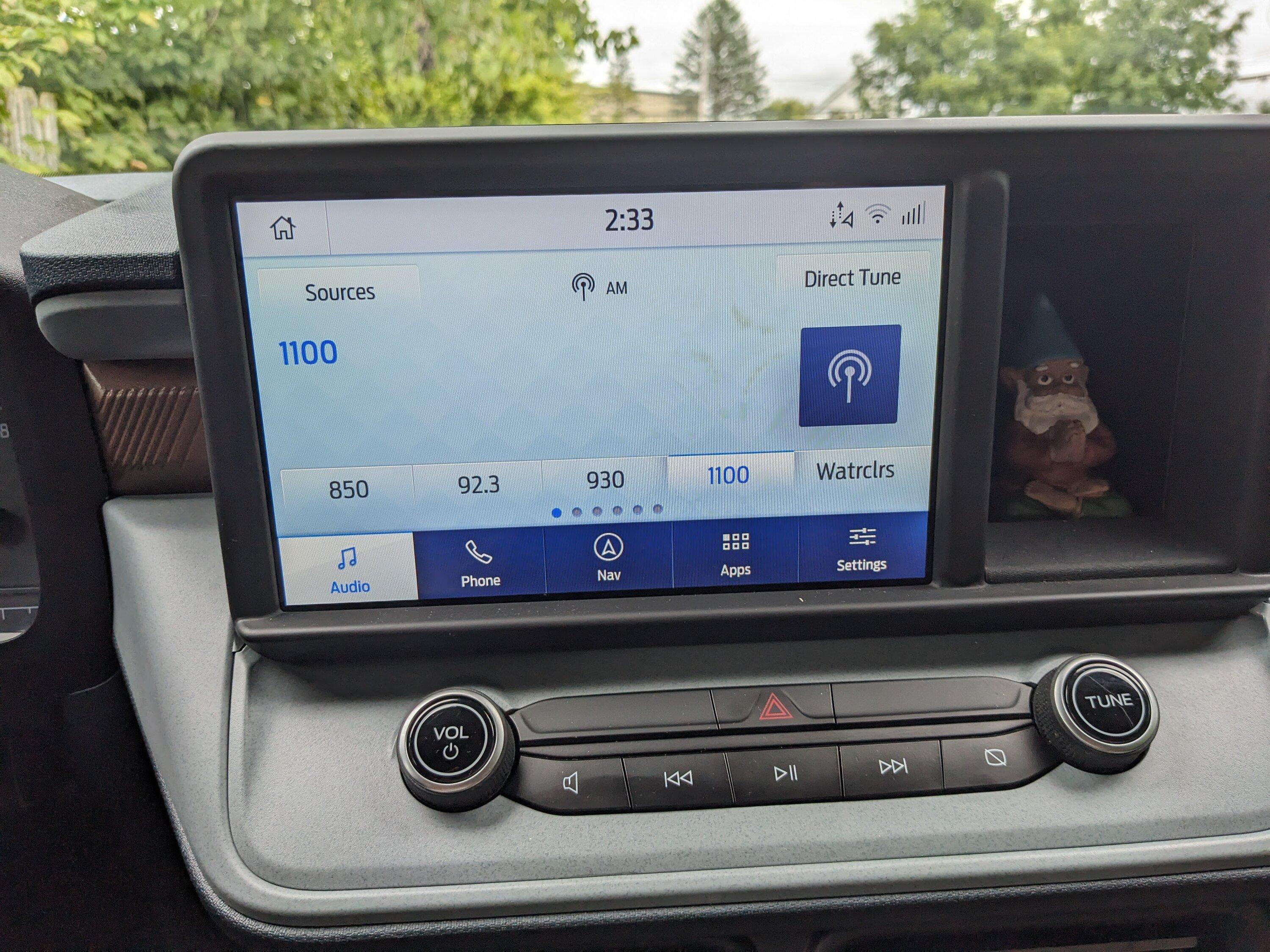 Ford Maverick Small storage space next to screen Gnome Buddha