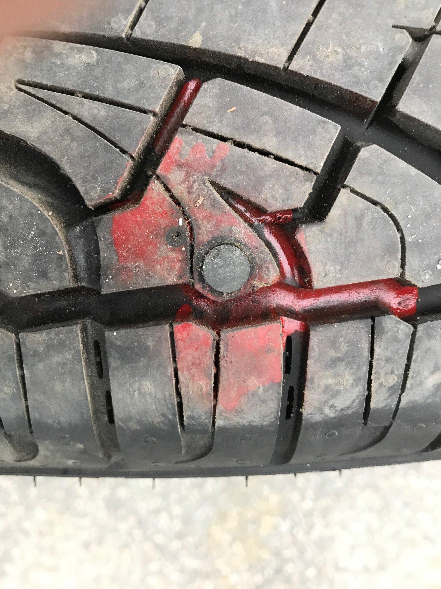 Ford Maverick Nail in tire already!!! patched.JPG