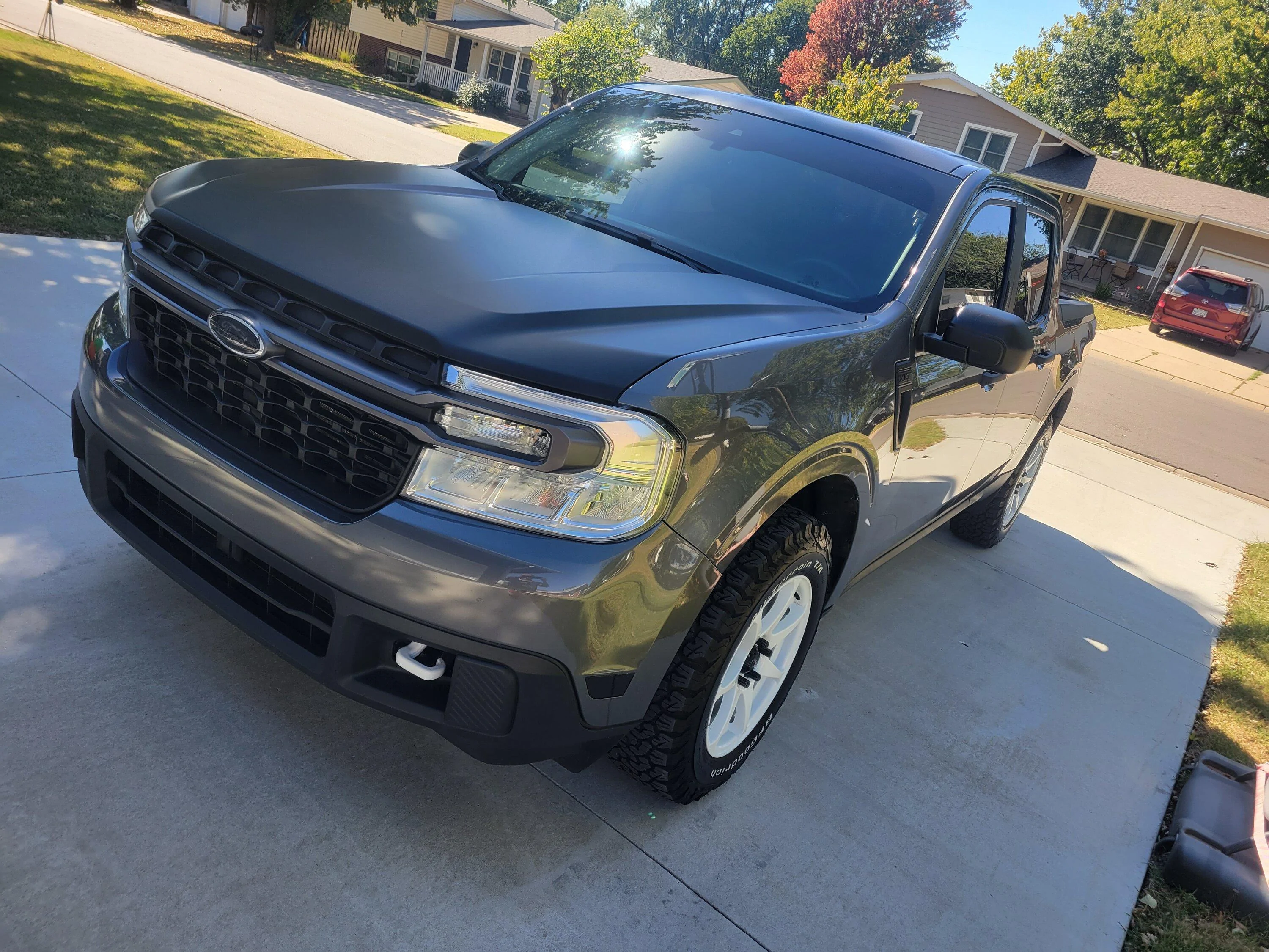 Ford Maverick Carbonized Gray Maverick XLT w/ matte black hood wrap + white wheels inbound4814420889557897317