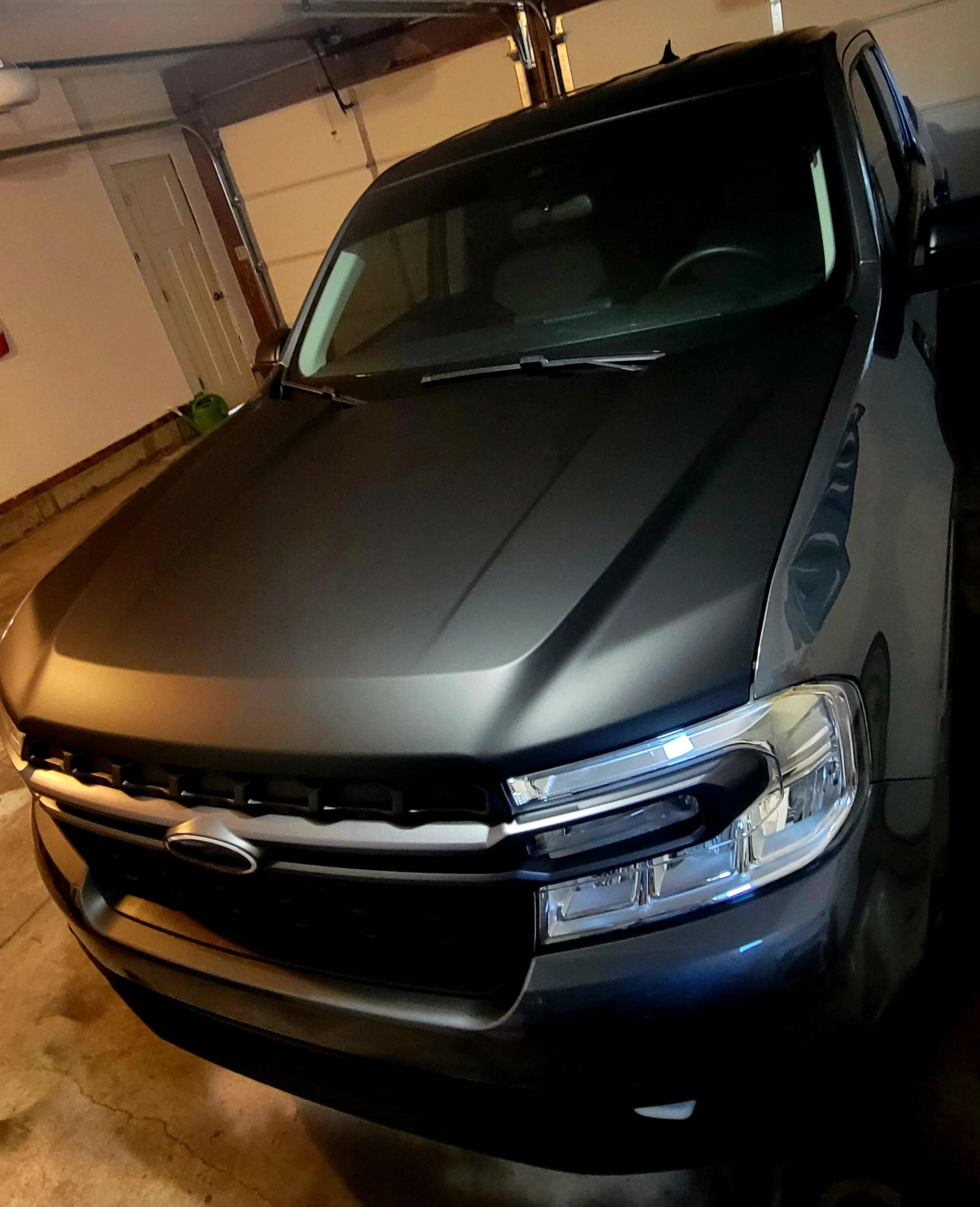 Ford Maverick Carbonized Gray Maverick XLT w/ matte black hood wrap + white wheels 20231009_184138