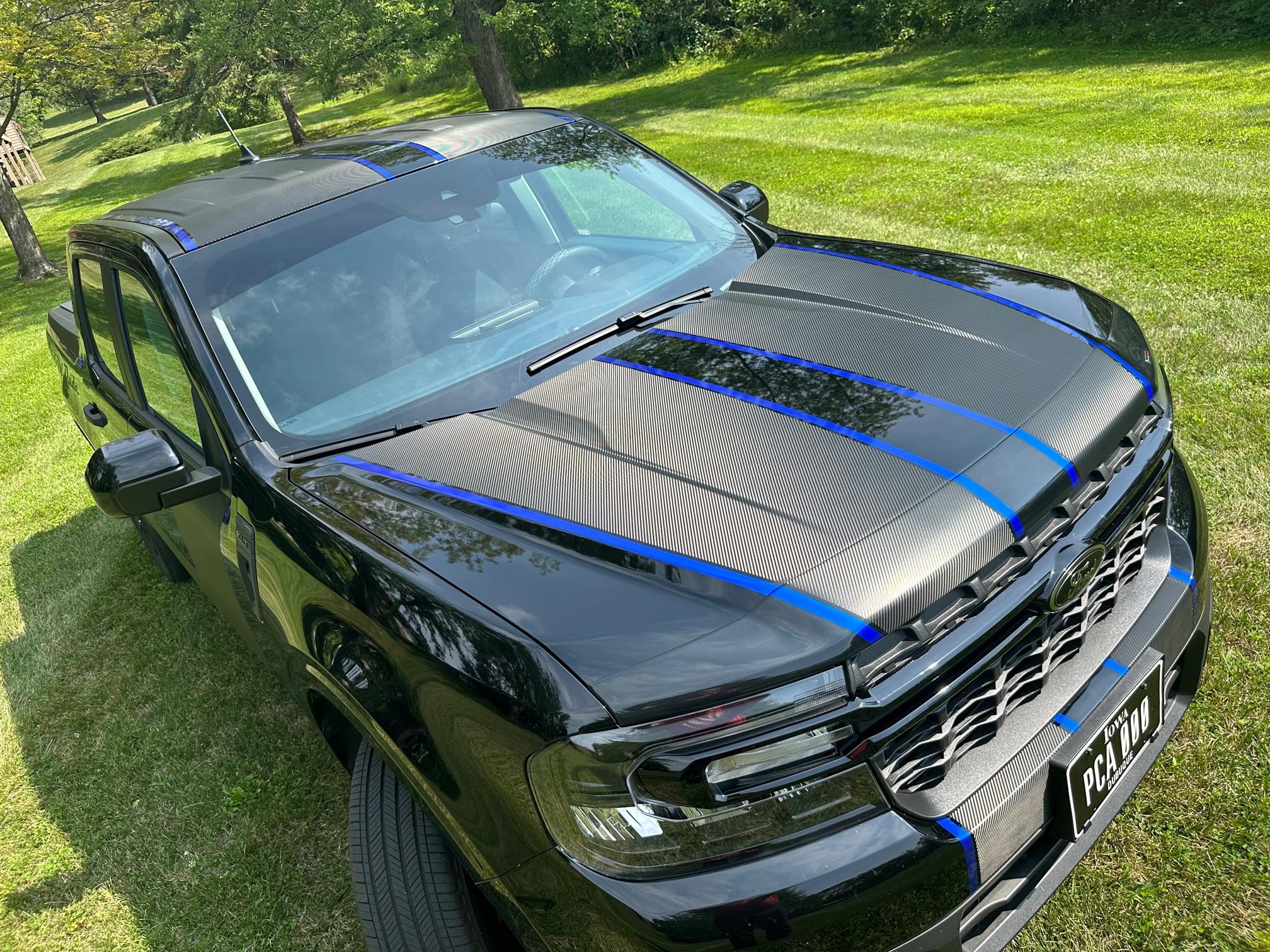 Ford Maverick Added carbon fiber matte wrap to the hood and roof + plus tint! IMG_4430