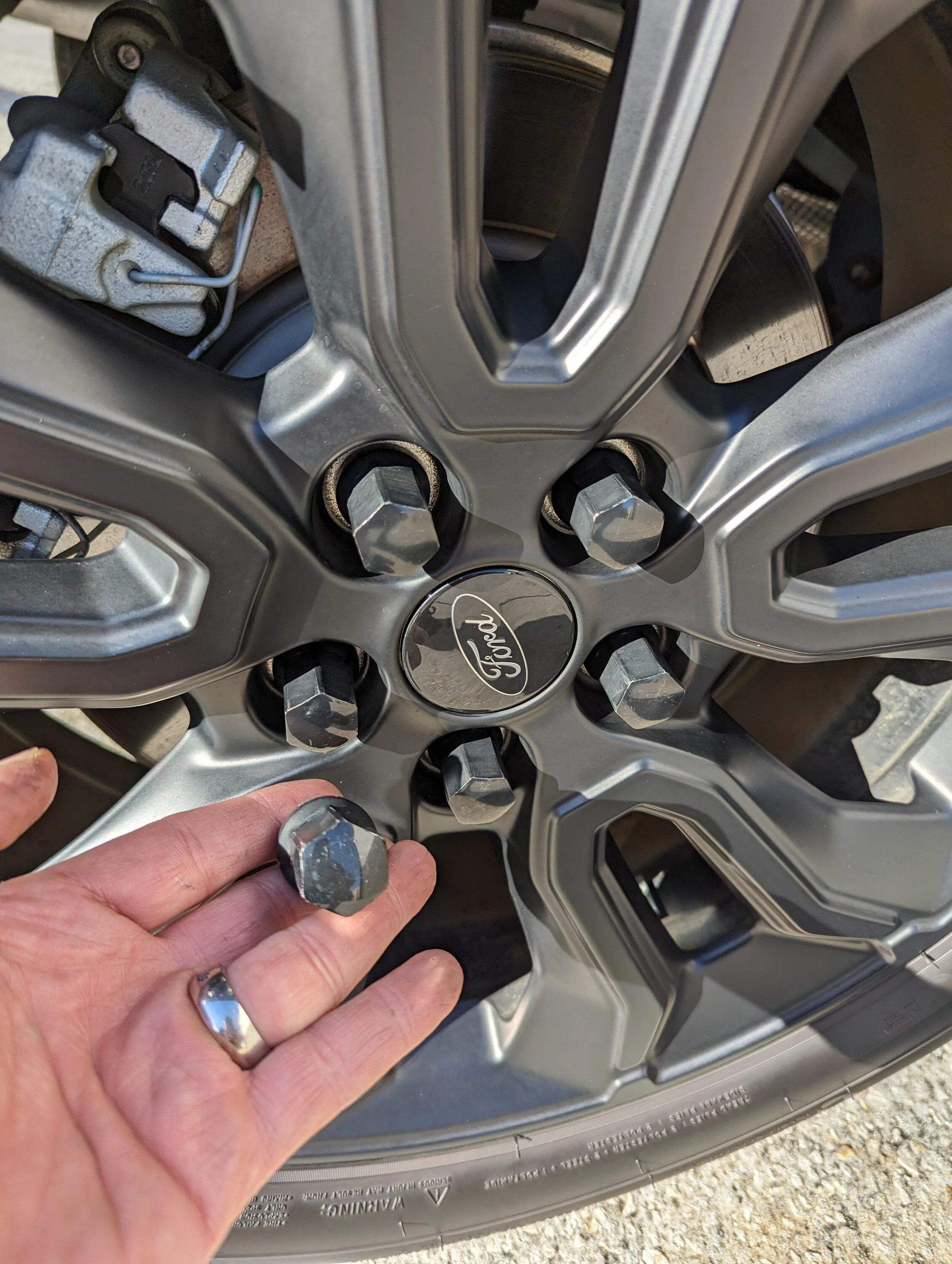 Ford Maverick Matte black lug nuts to replace OEM lugs PXL_20231015_212344916