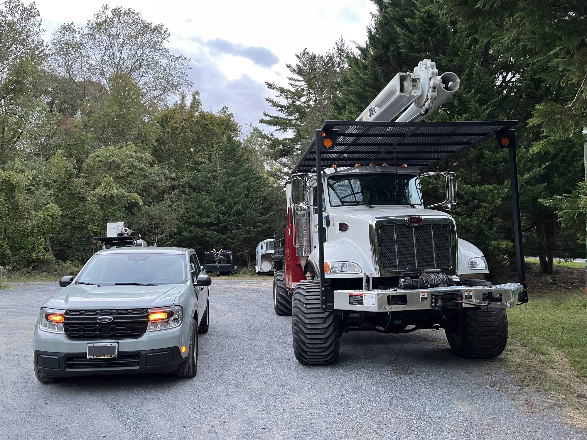 Ford Maverick Post your Maverick next to ridiculously large trucks - photos thread bigtruck