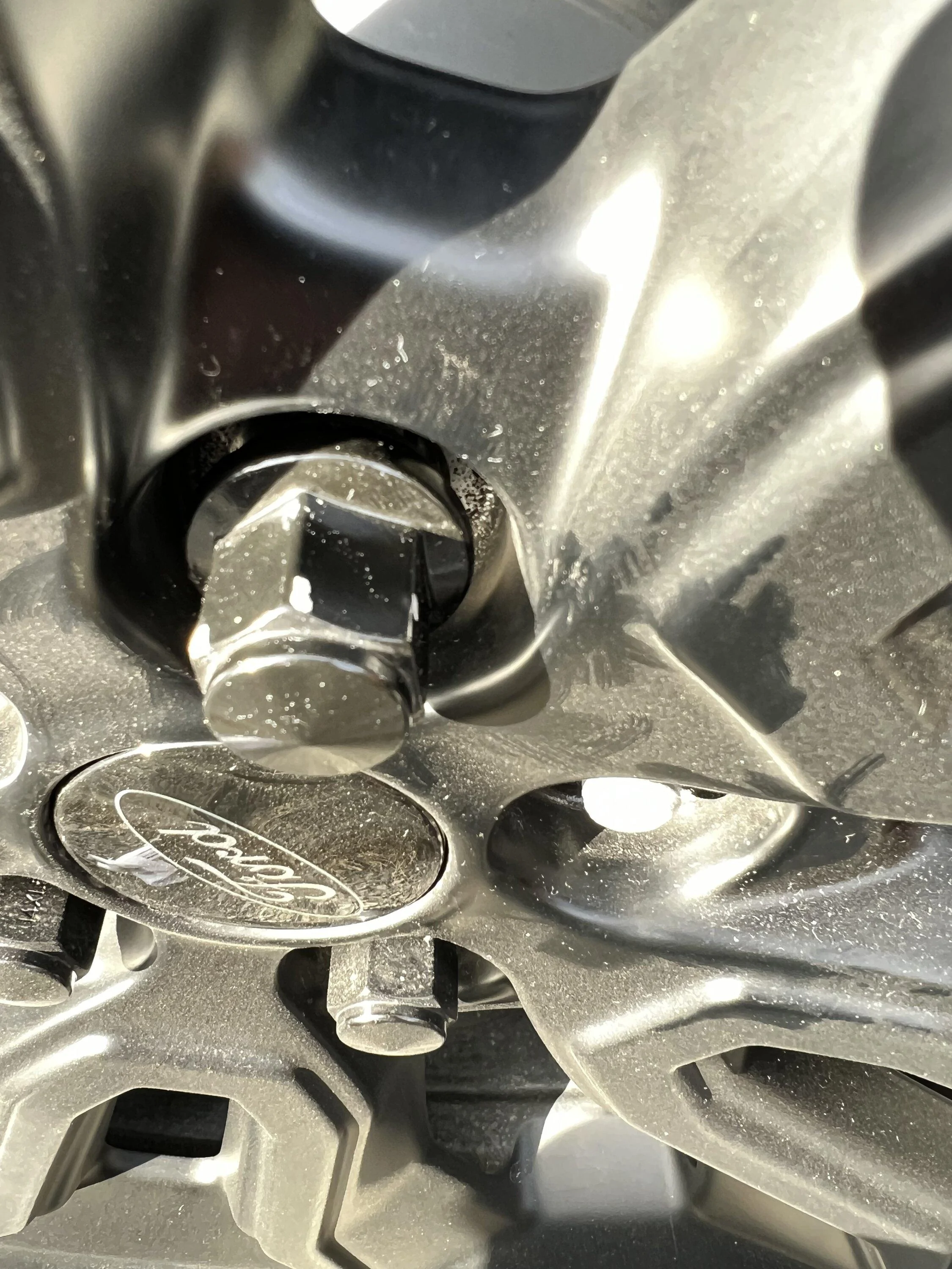 Ford Maverick Matte black lug nuts to replace OEM lugs IMG_5619