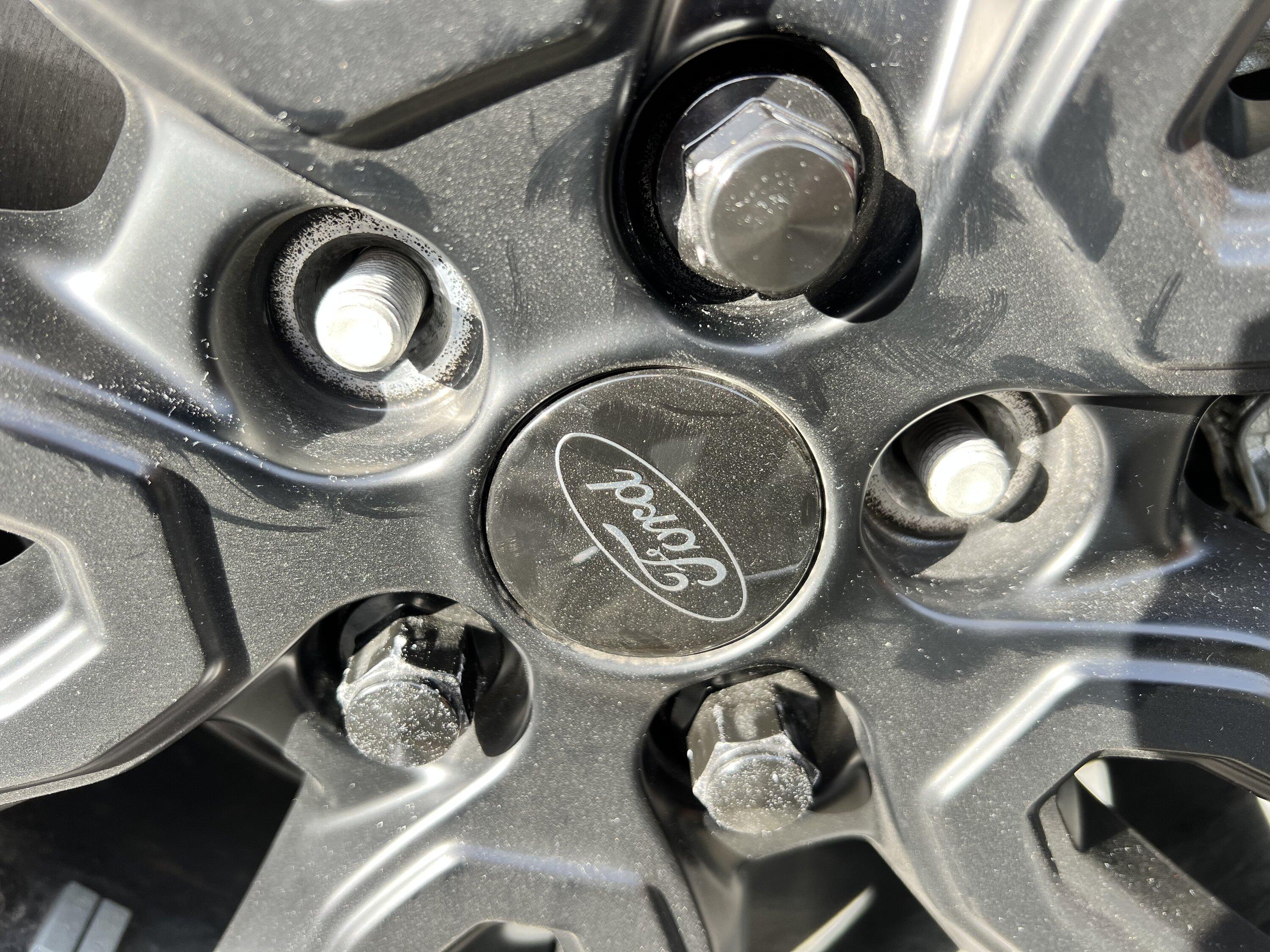 Ford Maverick Matte black lug nuts to replace OEM lugs IMG_5620