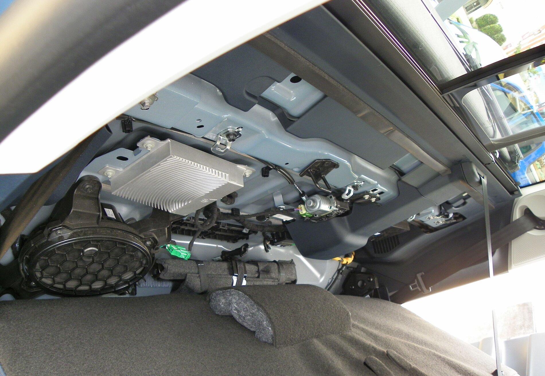 Ford Maverick 110 v Bed outlet. Behind Back Seat Lariat LUX.JPG