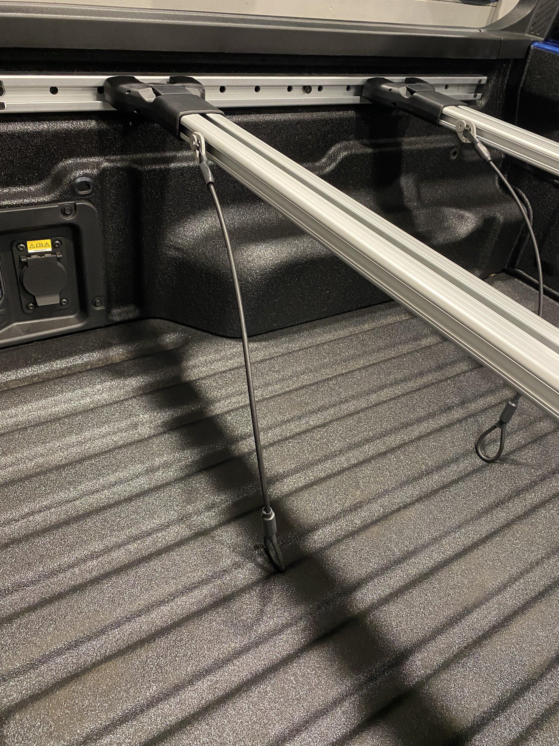 Ford Maverick Cargo management crossbar -- what are these cables? IMG_6554