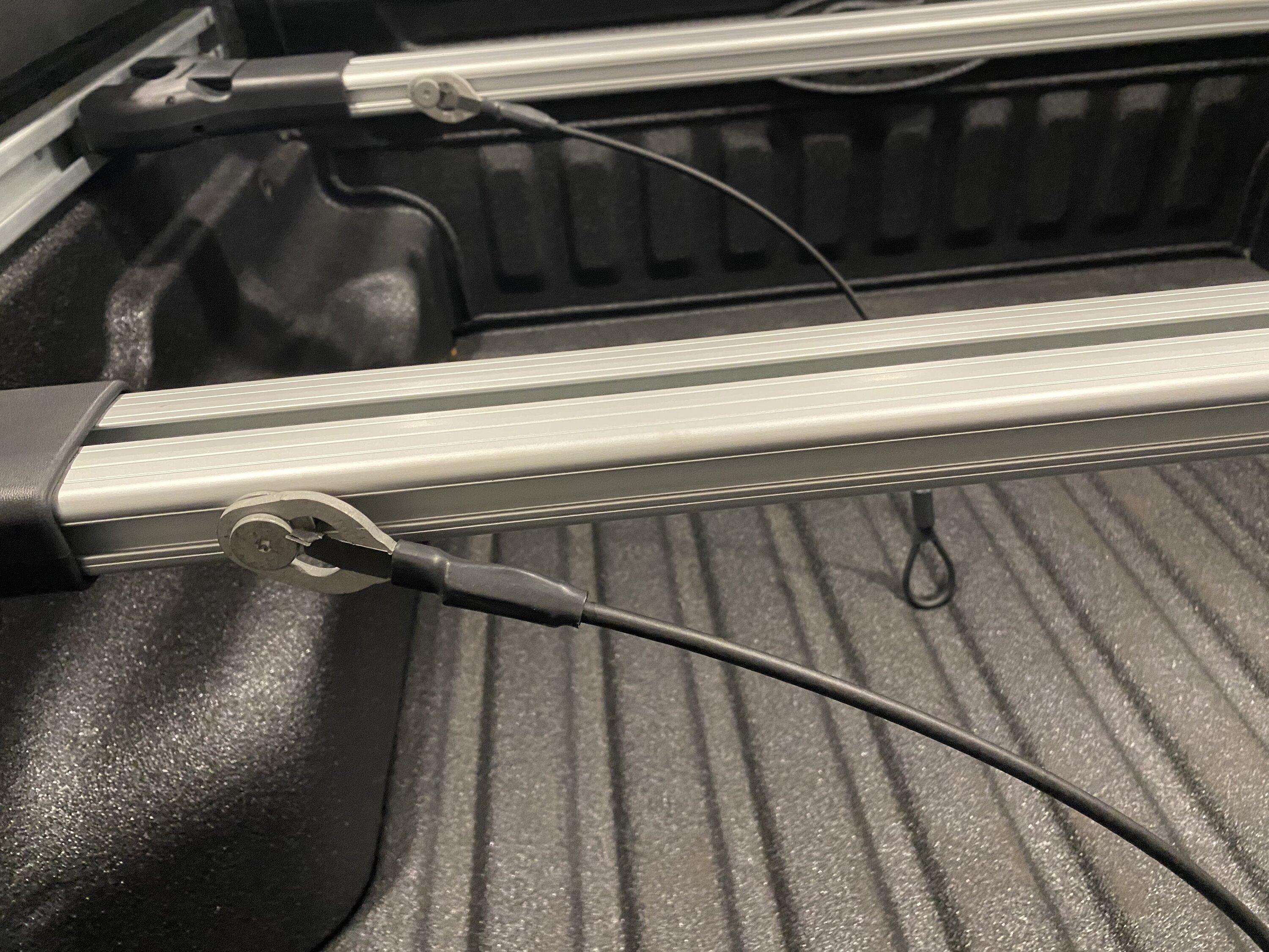 Ford Maverick Cargo management crossbar -- what are these cables? IMG_6555