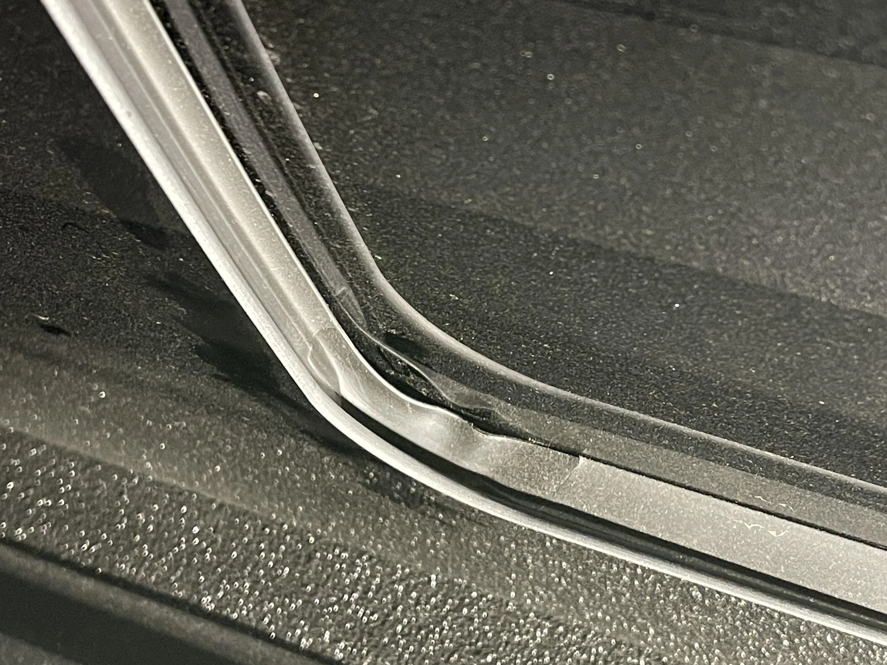 Ford Maverick Does anyone else have this issue? The weatherstripping in my back window appears to be lifted off. IMG_0266