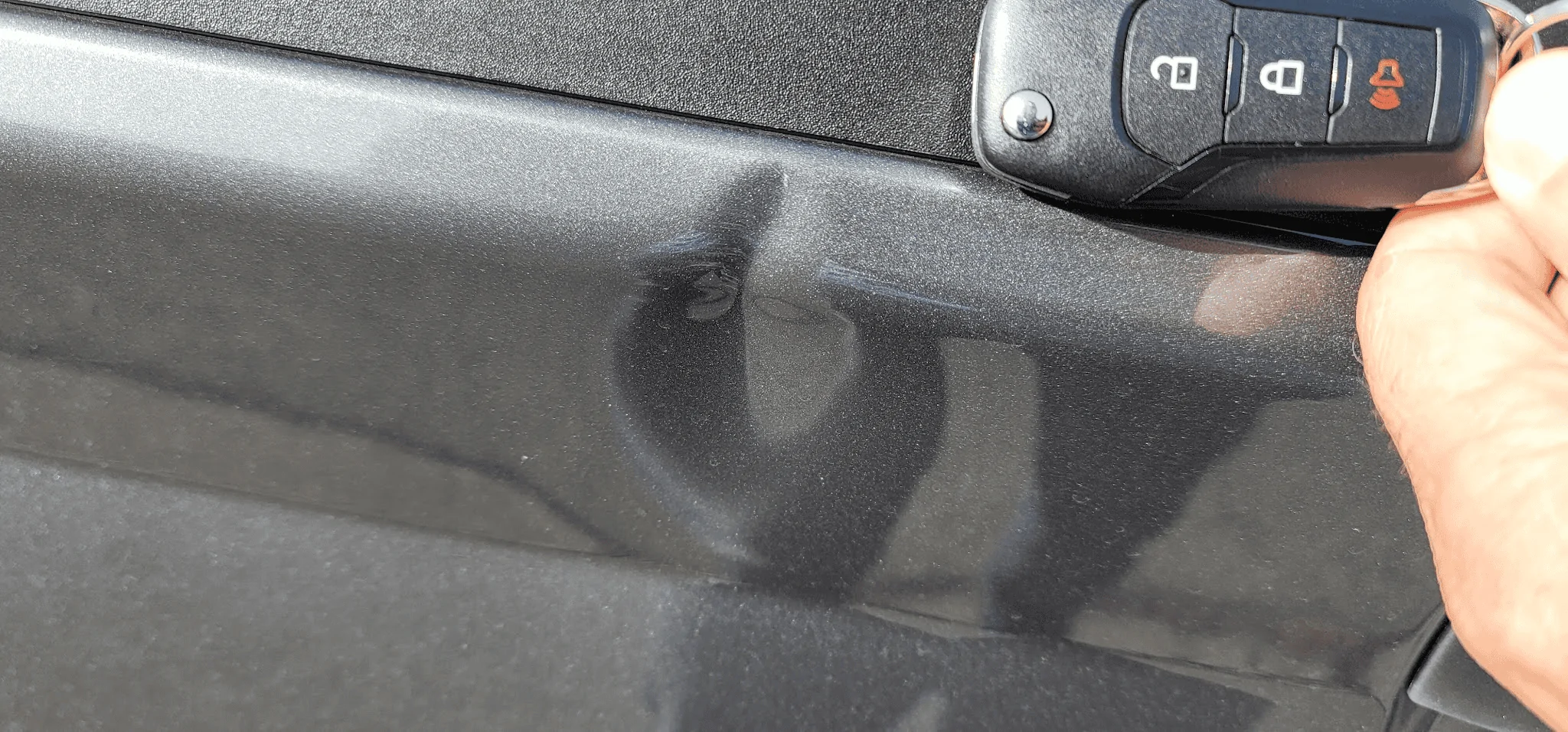 Ford Maverick Success with paintless dent repair on tailgate! 1701138747896