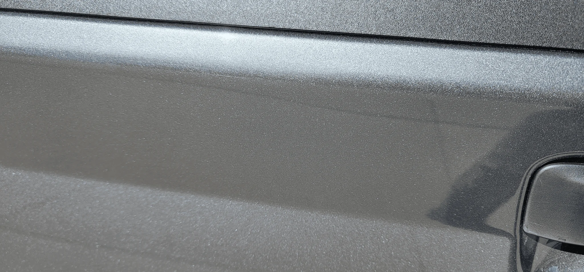 Ford Maverick Success with paintless dent repair on tailgate! 1701138782034