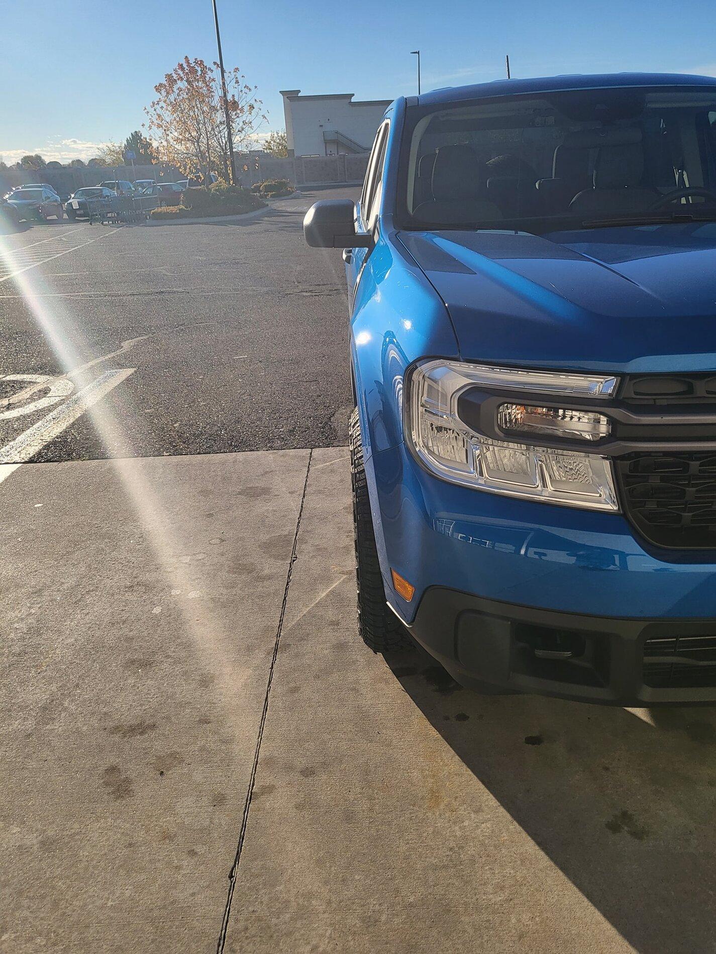 Ford Maverick VELOCITY BLUE Maverick Photos Thread 245:65:17 open country 3 tires on velocity blue 2022 ford Maverick 