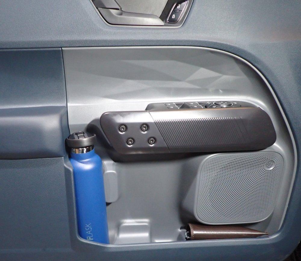 Ford Maverick What does all those cubbies and storages designed for? bottle iron flask 24 oz