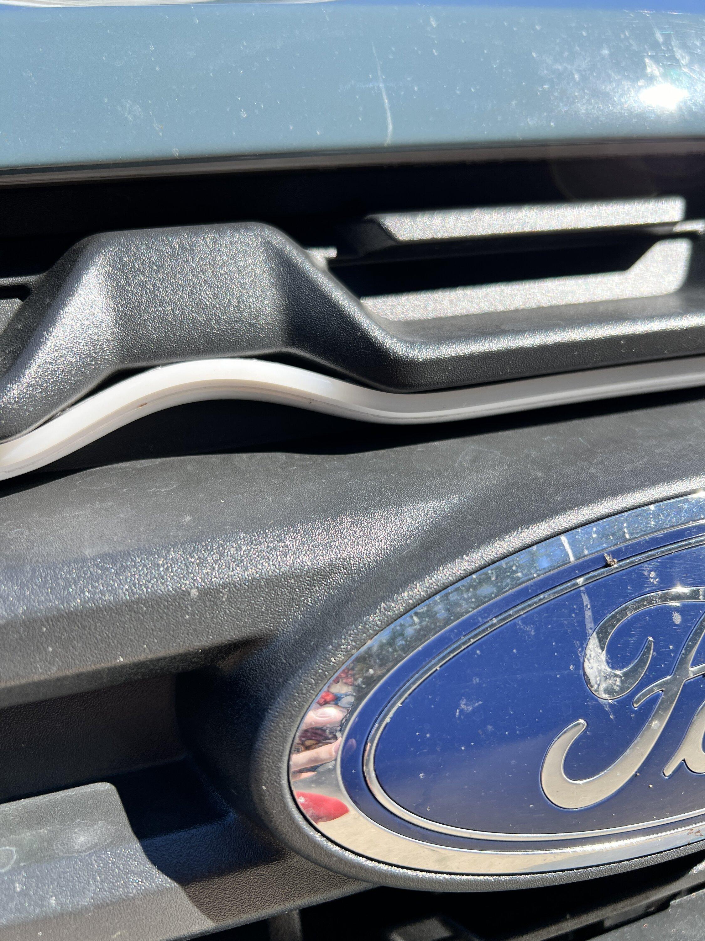 Ford Maverick LED lights installed along hood/grille IMG_0547