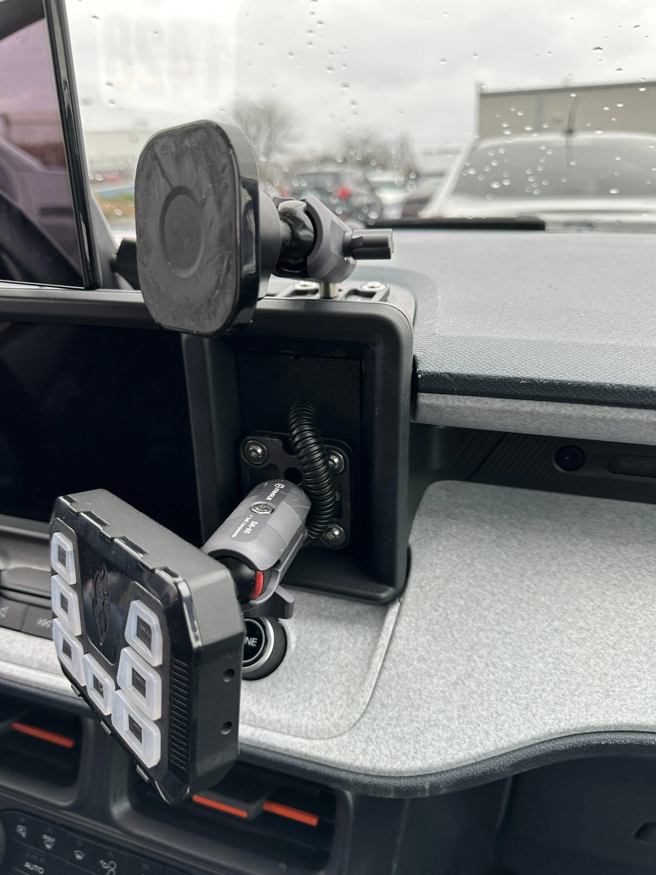 Ford Maverick Anyone have a solid cubby solution for holding phone with case? IMG_5982