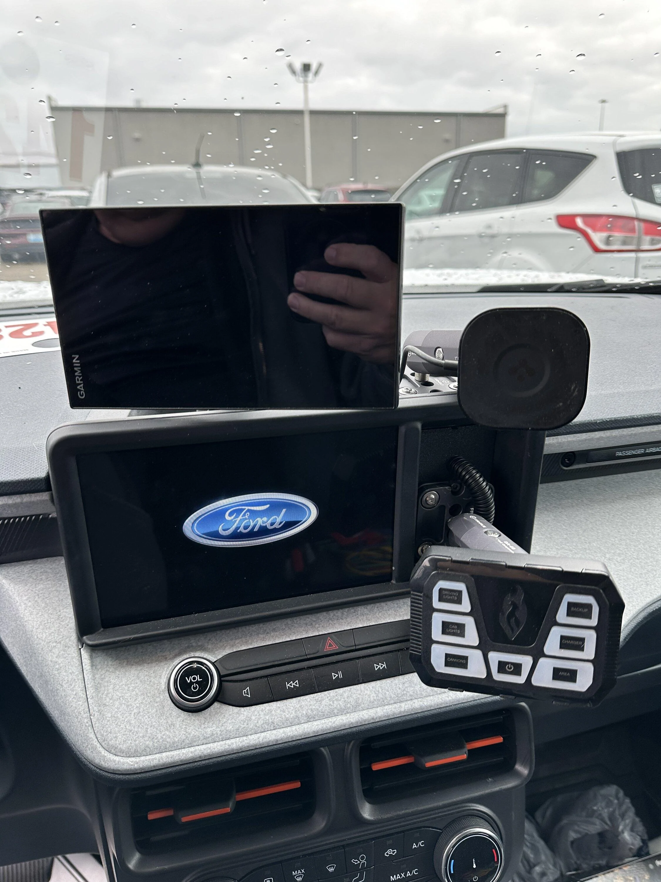 Ford Maverick Anyone have a solid cubby solution for holding phone with case? IMG_5981