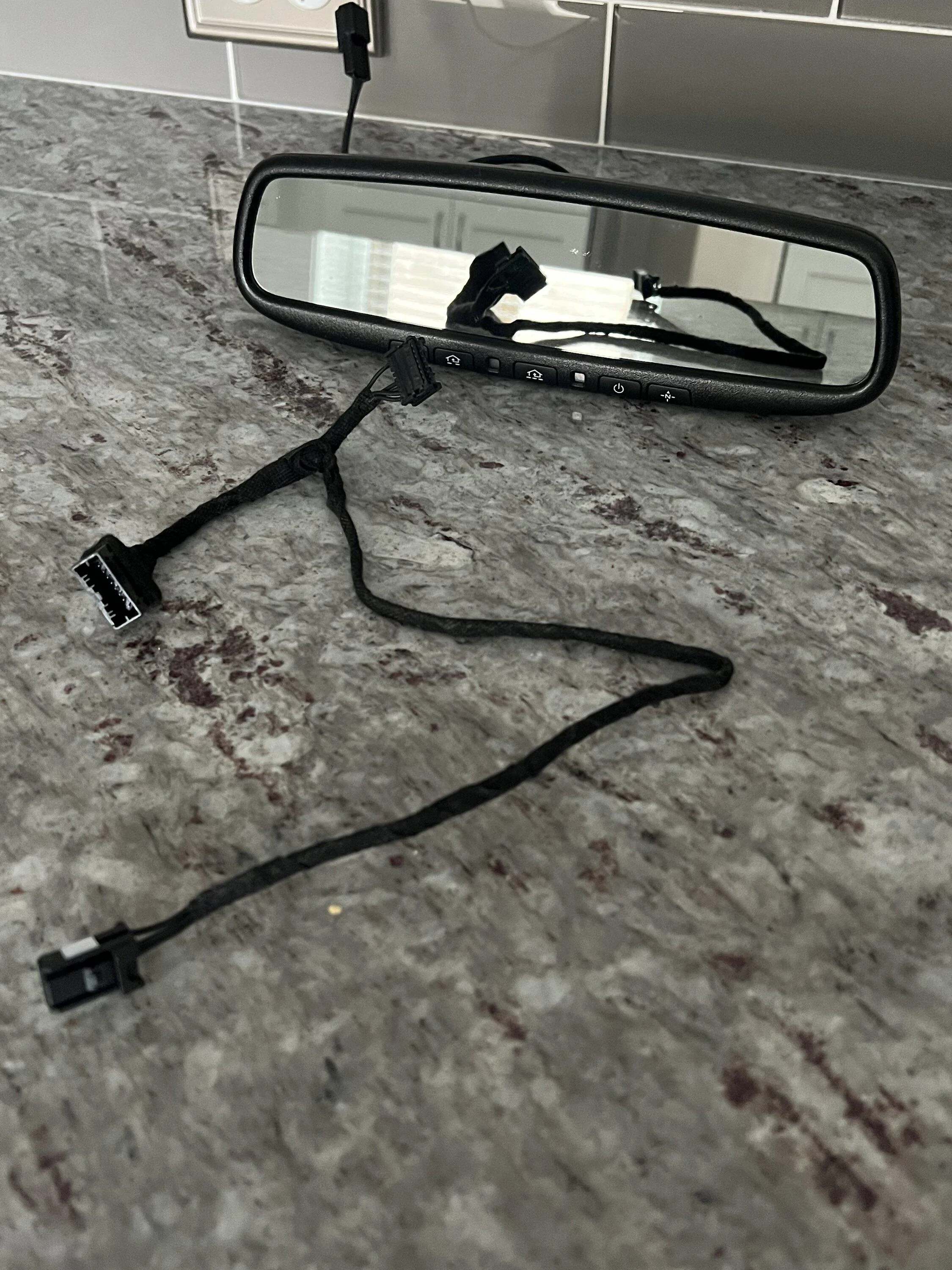 Ford Maverick Installed the Kia compass, auto-dimming, homelink mirror F03688B9-5D76-4265-9F11-A011A37B1F55