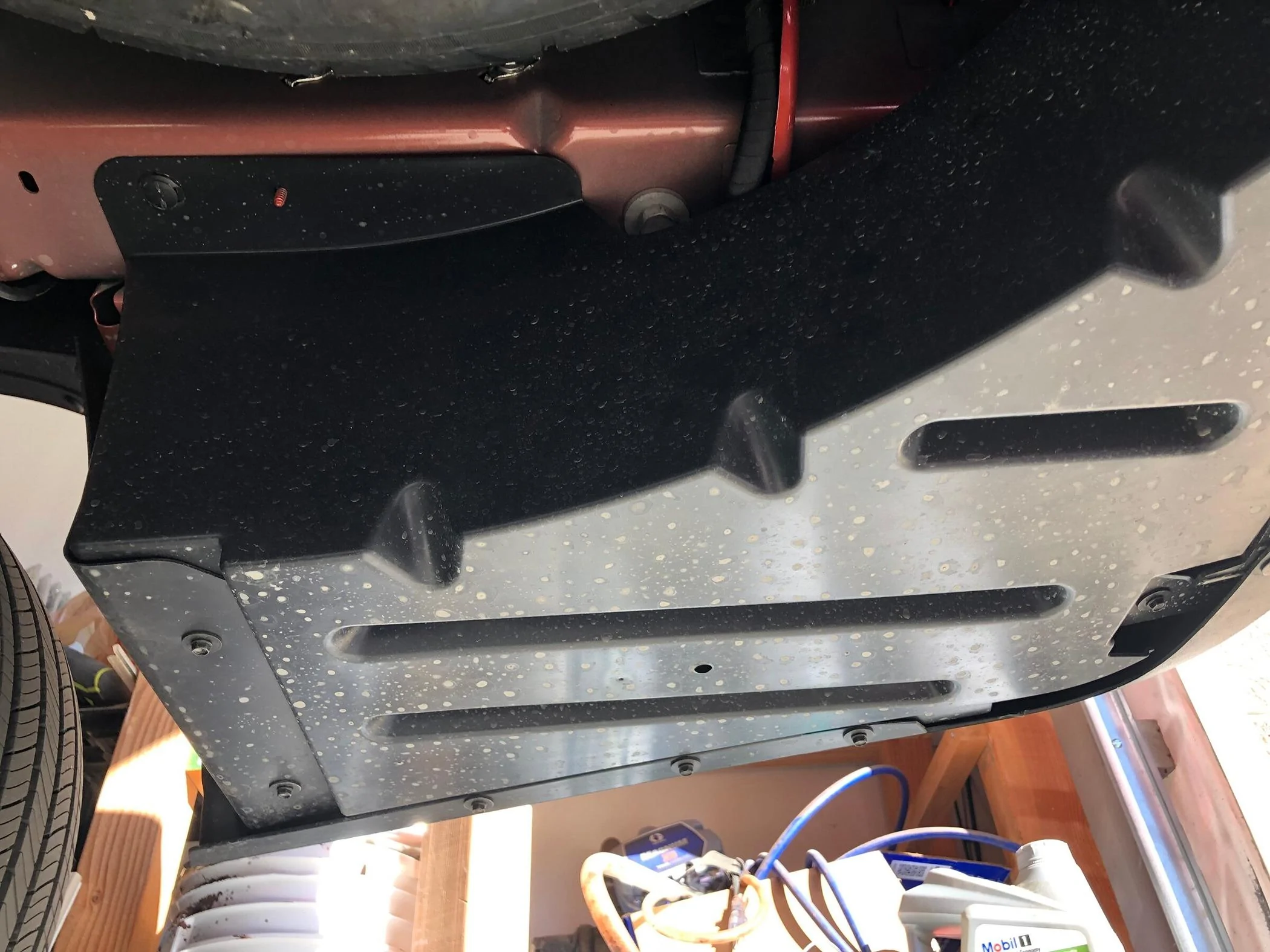 Ford Maverick DIY - build shield to cover underbody cavity behind left rear tire right maverick