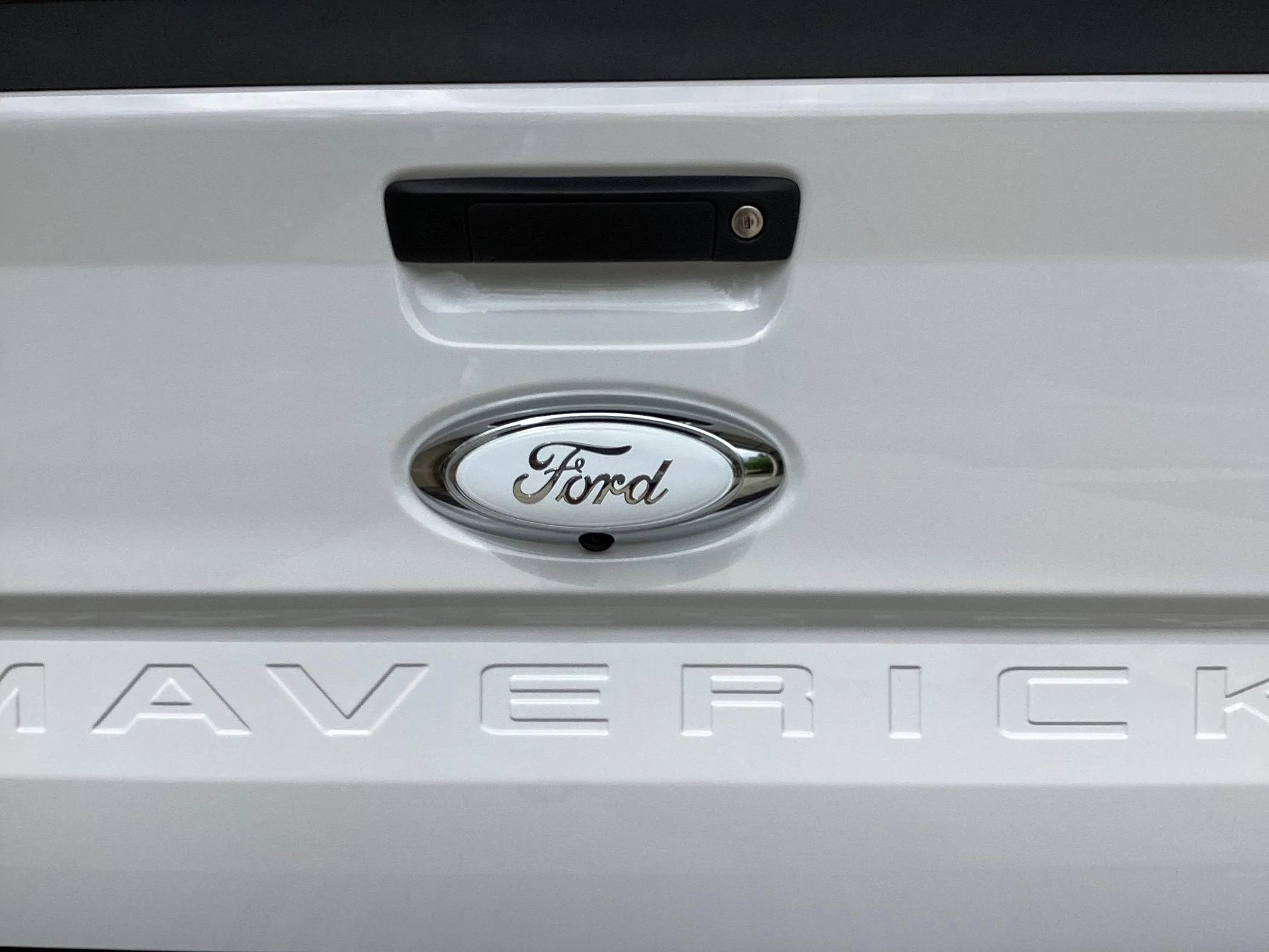 Ford Maverick Chrome Ford emblem covers. IMG_0146