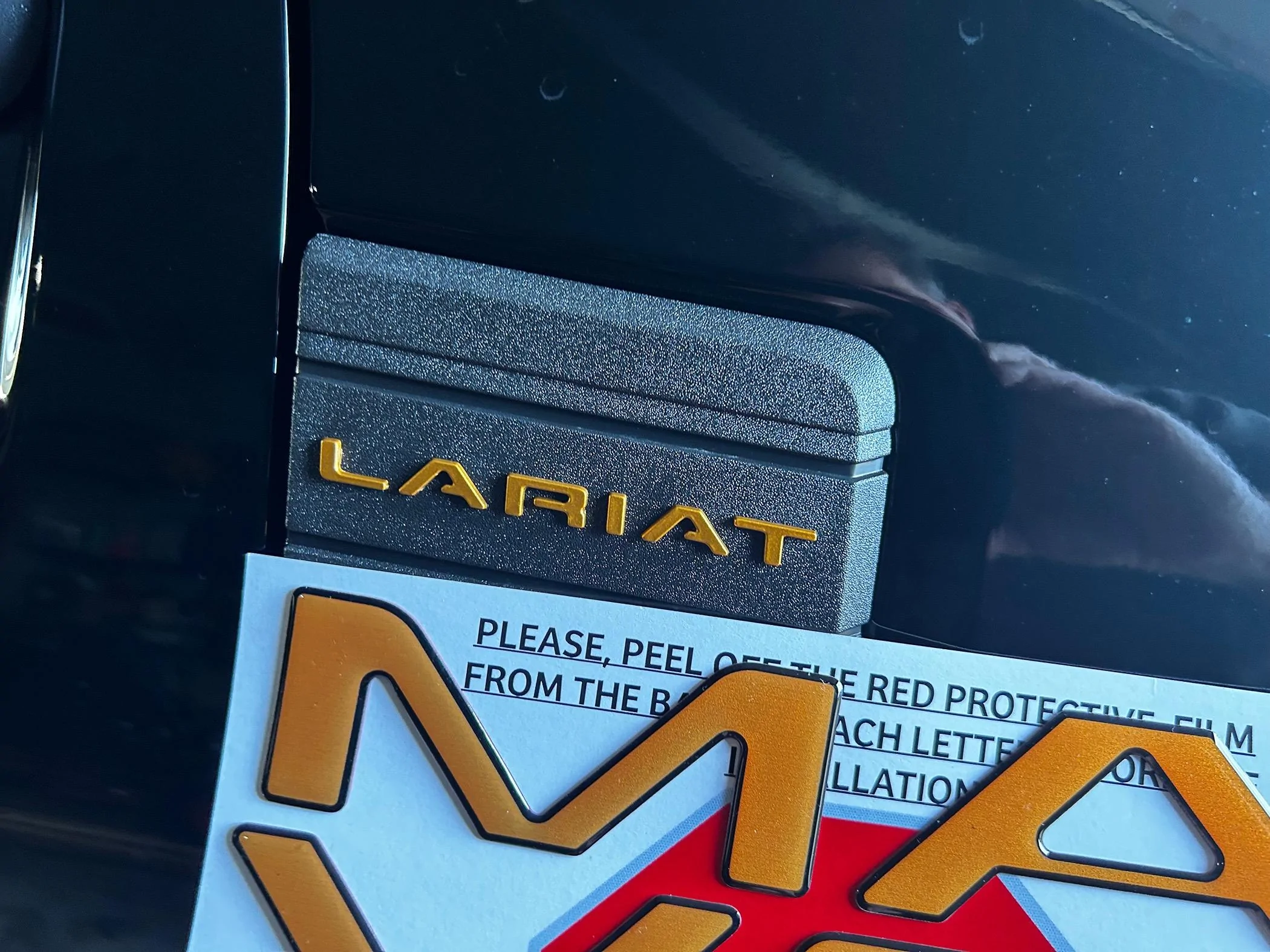 Ford Maverick Tailgate Lettering in Tremor Orange (on black Maverick) IMG_1853