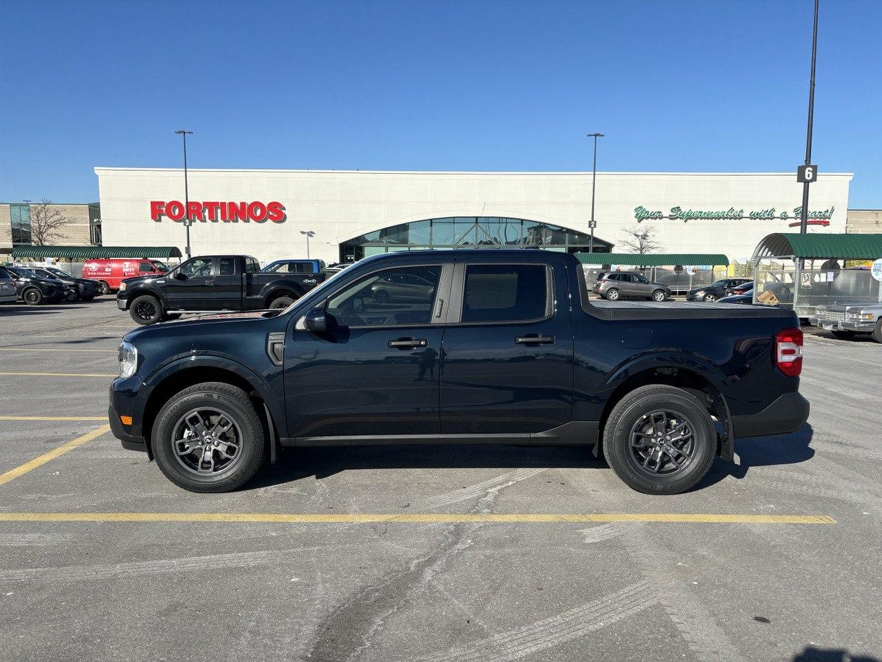 Ford Maverick Kumho Crugen HT51 (235/70/17) side
